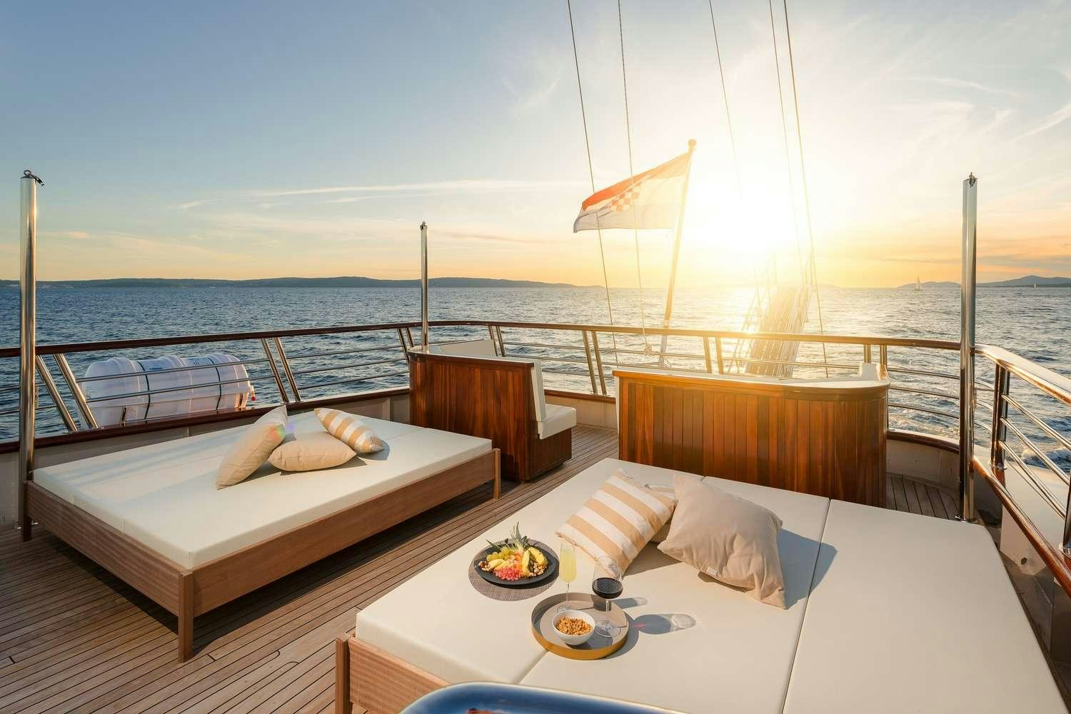 a balcony overlooking the ocean aboard SON DE MAR Yacht for Charter