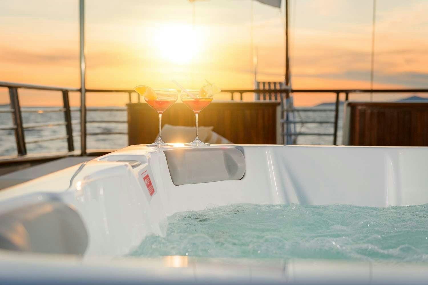 a couple of drinks on a boat aboard SON DE MAR Yacht for Charter