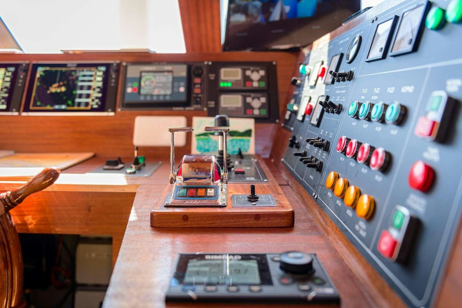 a computer with a game board aboard SON DE MAR Yacht for Charter