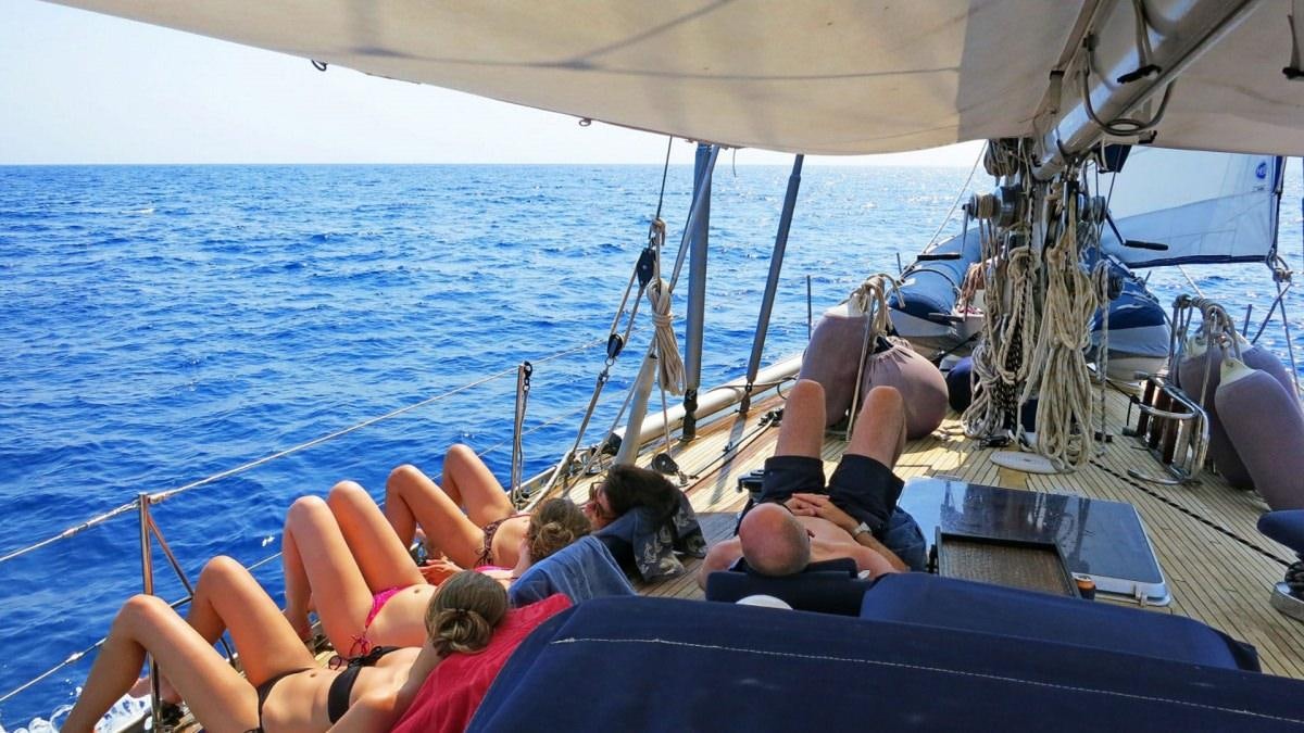 people on a boat aboard SHAITAN (65' SWAN) Yacht for Charter