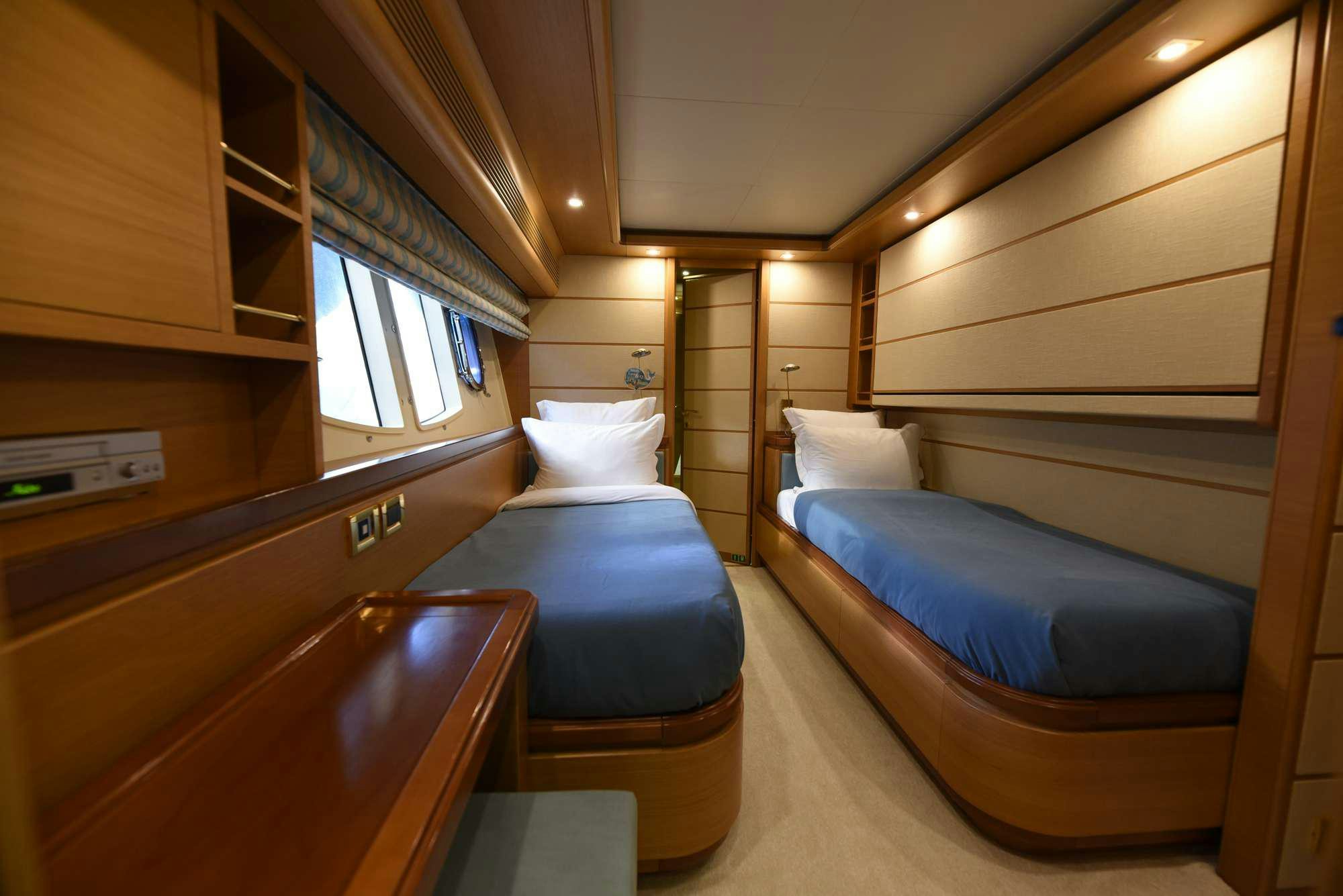 a room with bunk beds aboard PAREAKKI Yacht for Charter