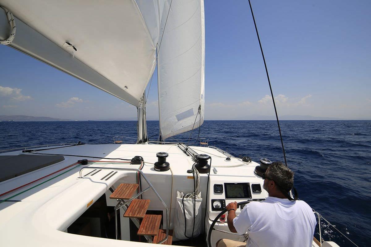 a man on a boat aboard DANIELA II Yacht for Charter