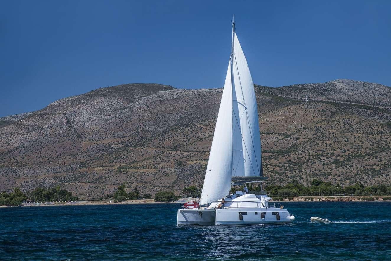 a sailboat on the water aboard ODYSSEY Yacht for Charter