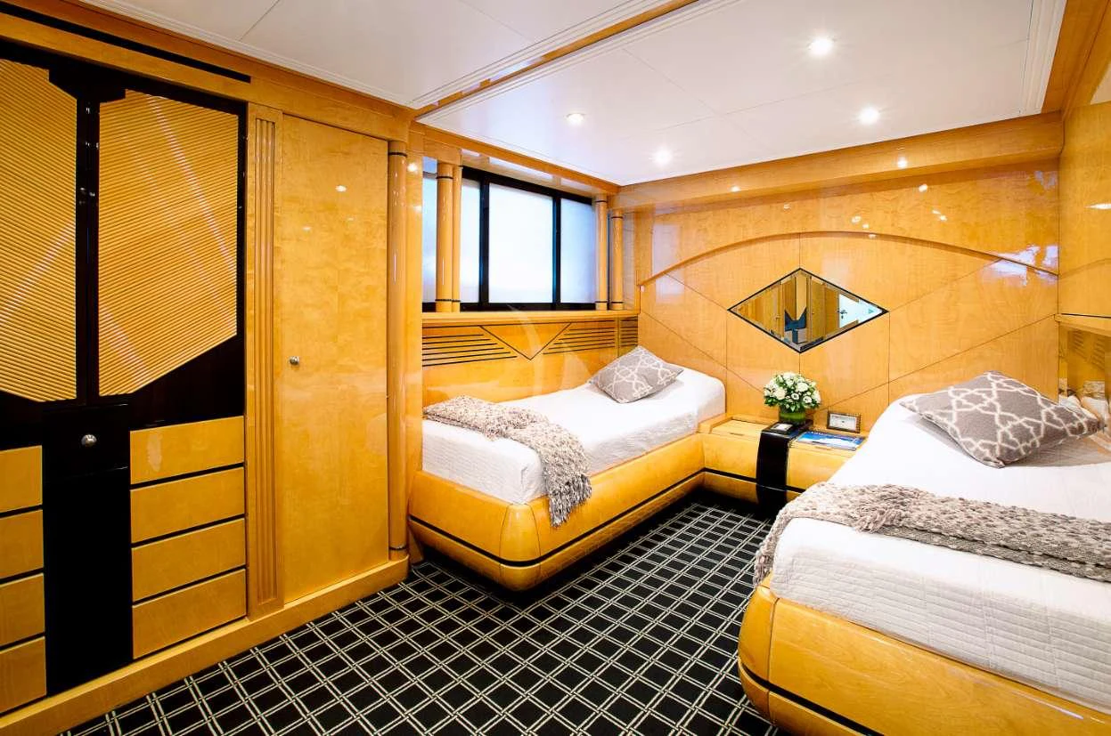 a room with two beds aboard MILOS AT SEA Yacht for Charter