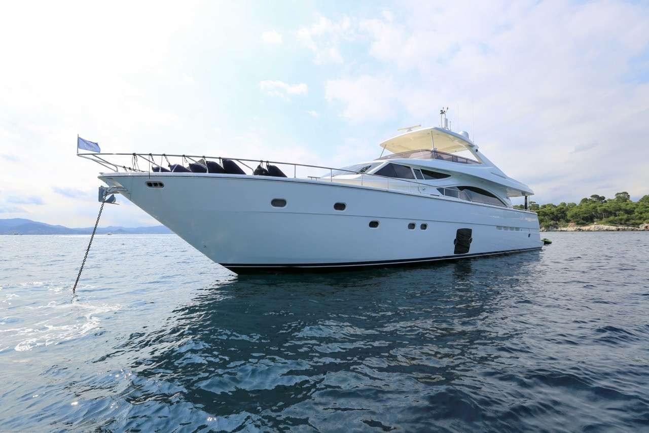 a white boat on the water aboard ONYX Yacht for Charter