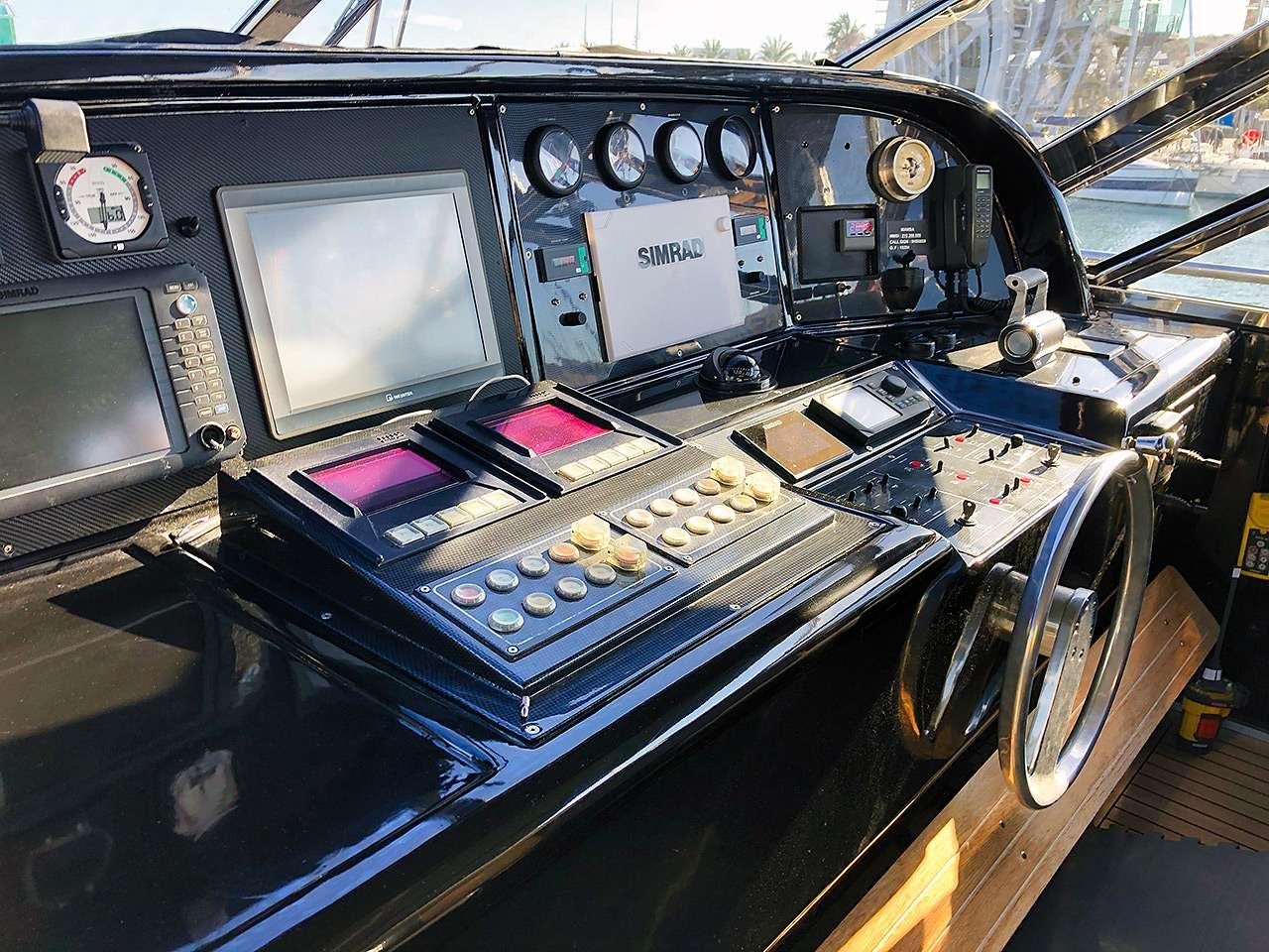 inside of a car aboard MAMBA Yacht for Charter