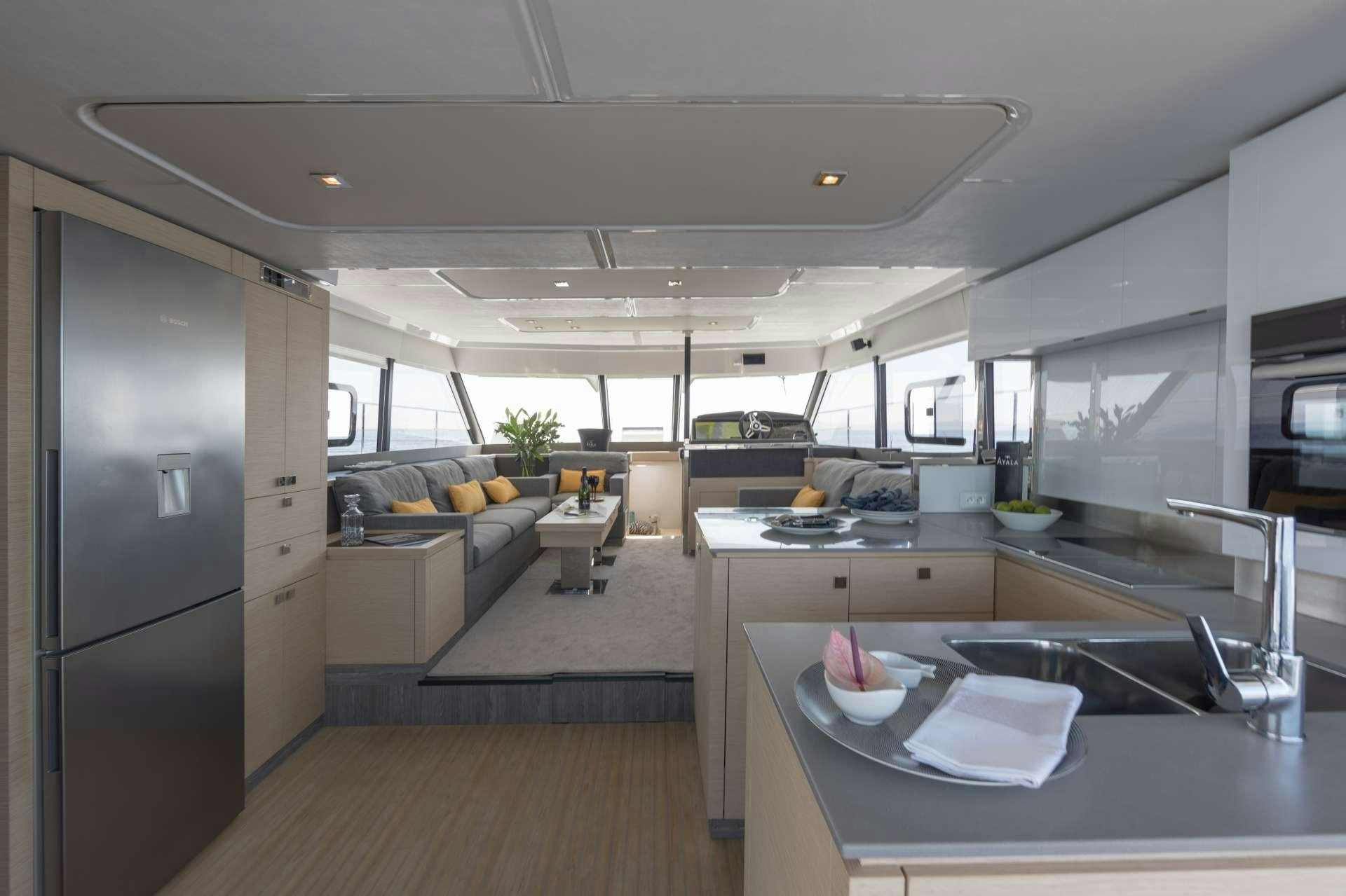a modern kitchen with a large open concept aboard ENDLESS BEAUTY Yacht for Charter