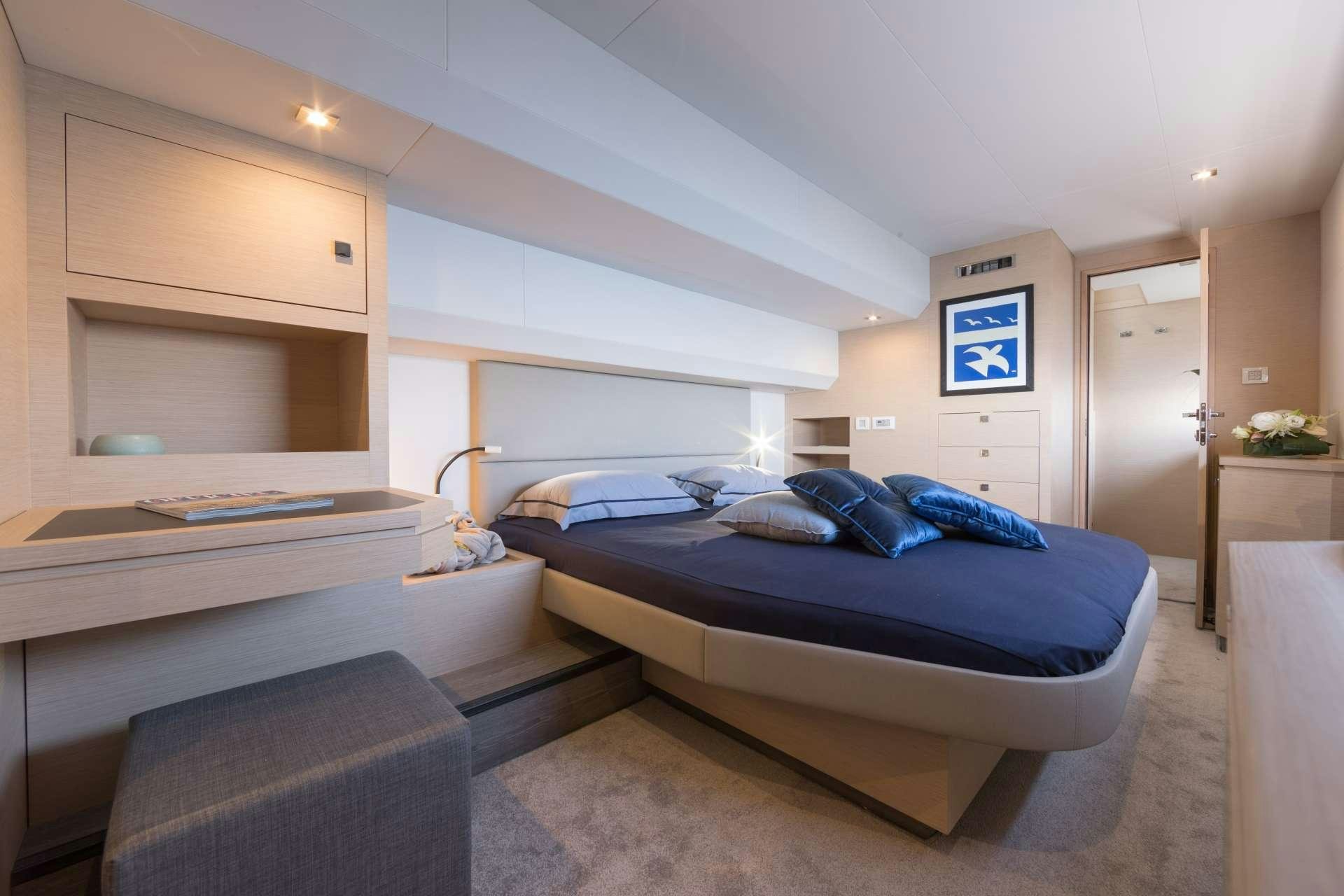 a bedroom with a bed aboard ENDLESS BEAUTY Yacht for Charter