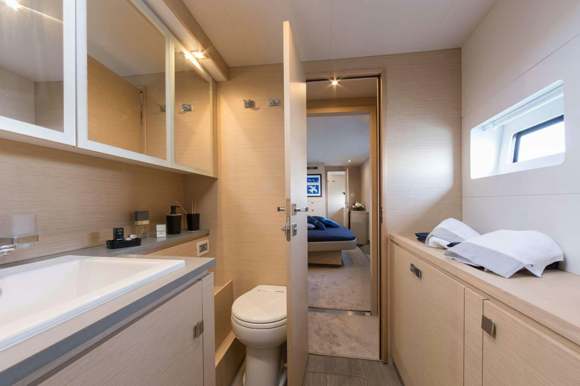 a bathroom with a toilet and a sink aboard ENDLESS BEAUTY Yacht for Charter