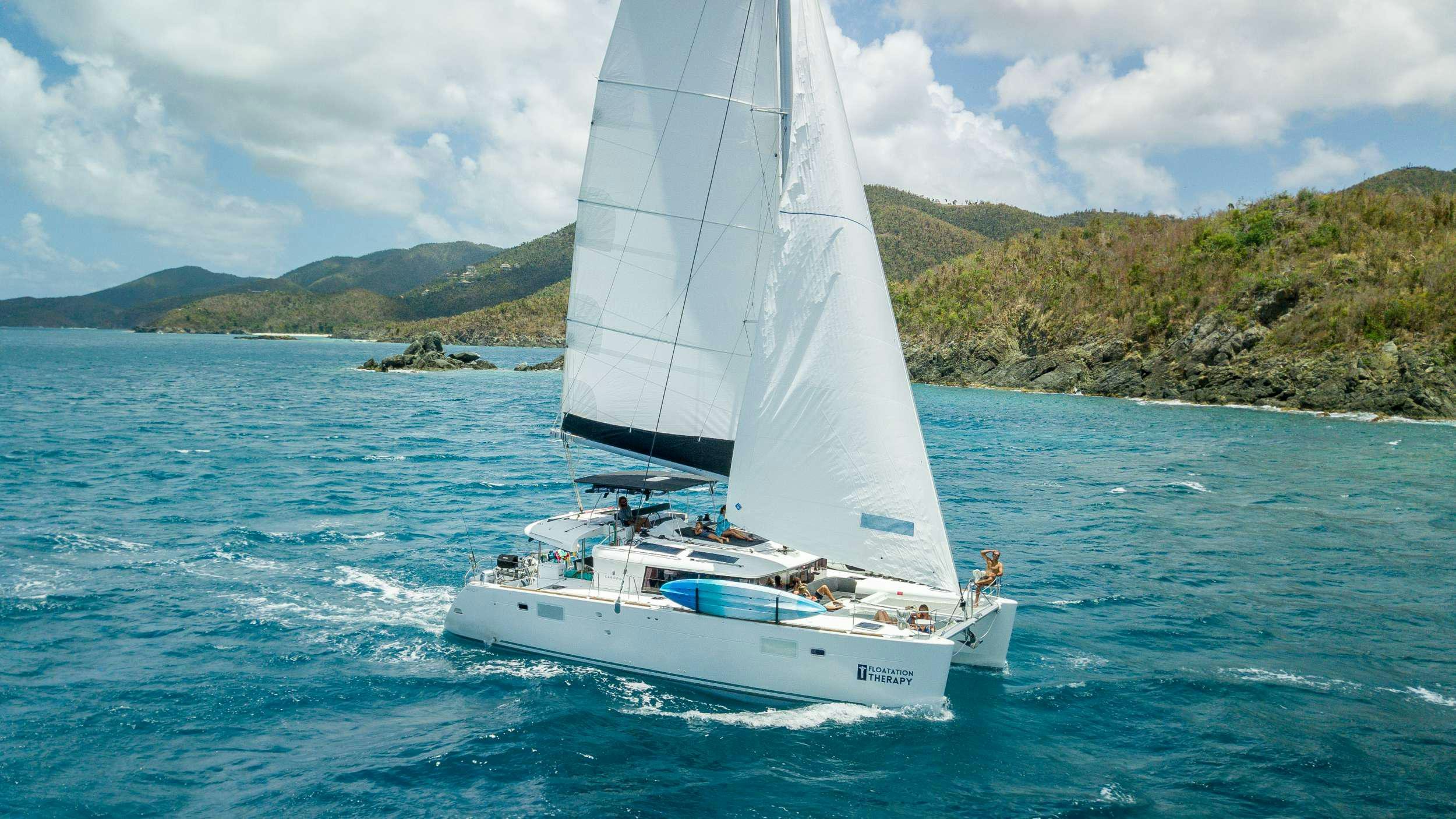 a sailboat on the water aboard FLOATATION THERAPY Yacht for Charter