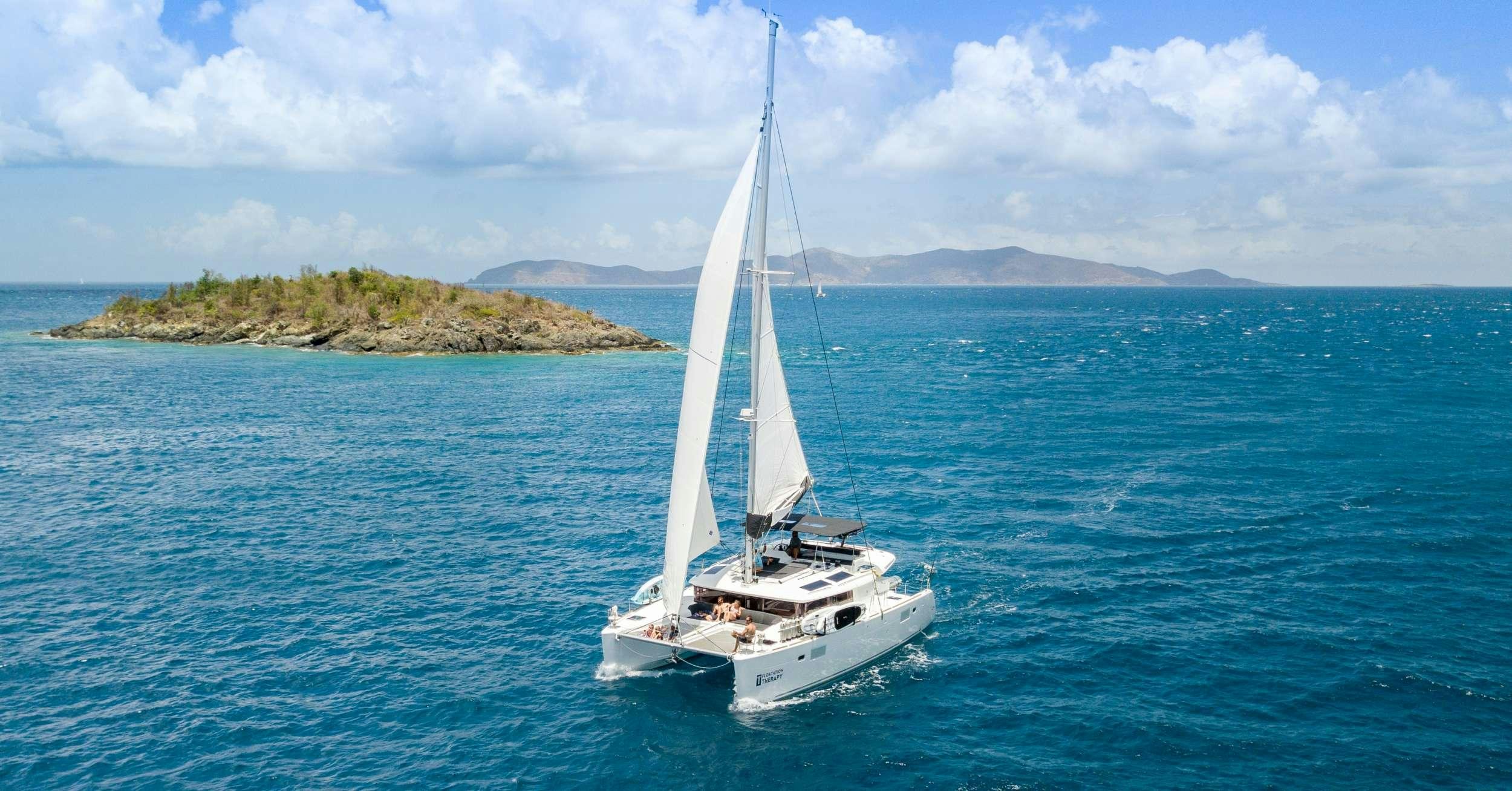 a sailboat in the water aboard FLOATATION THERAPY Yacht for Charter