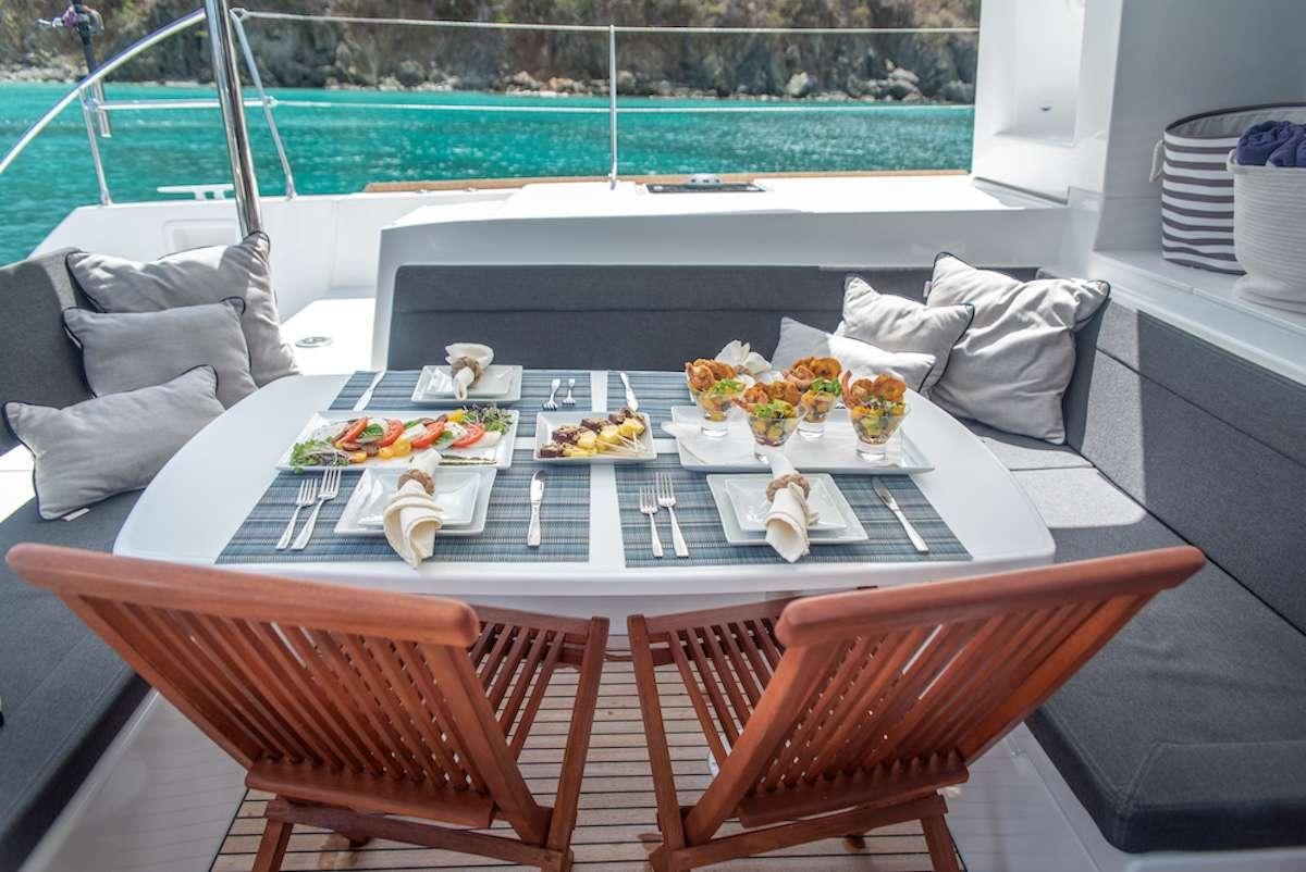 a table with food on it aboard FLOATATION THERAPY Yacht for Charter