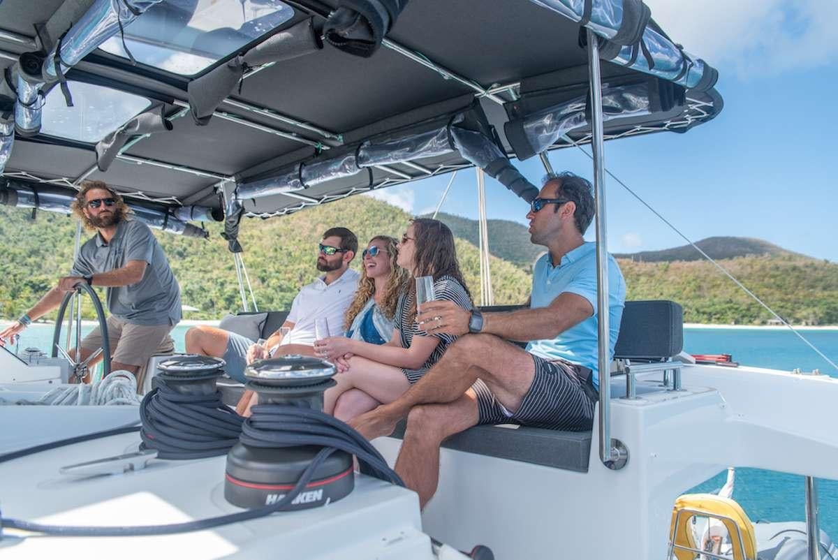 a group of people sitting in a boat aboard FLOATATION THERAPY Yacht for Charter
