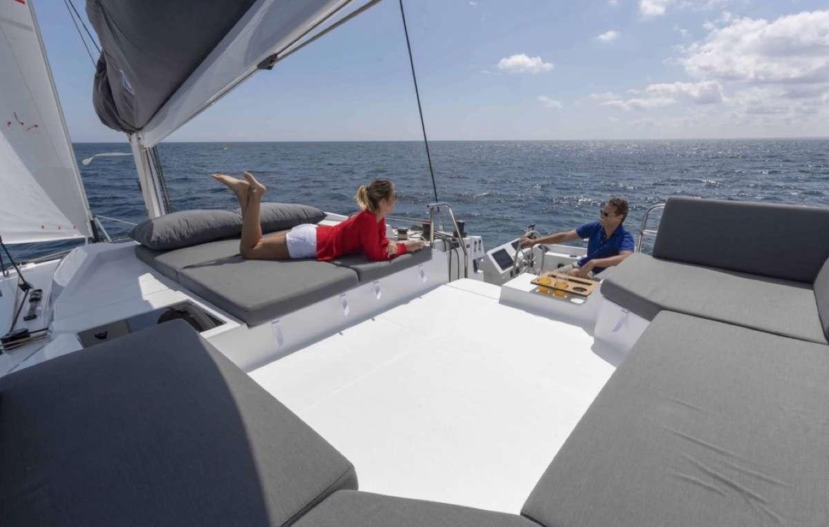 people sitting on a boat aboard Ruckus Yacht for Charter