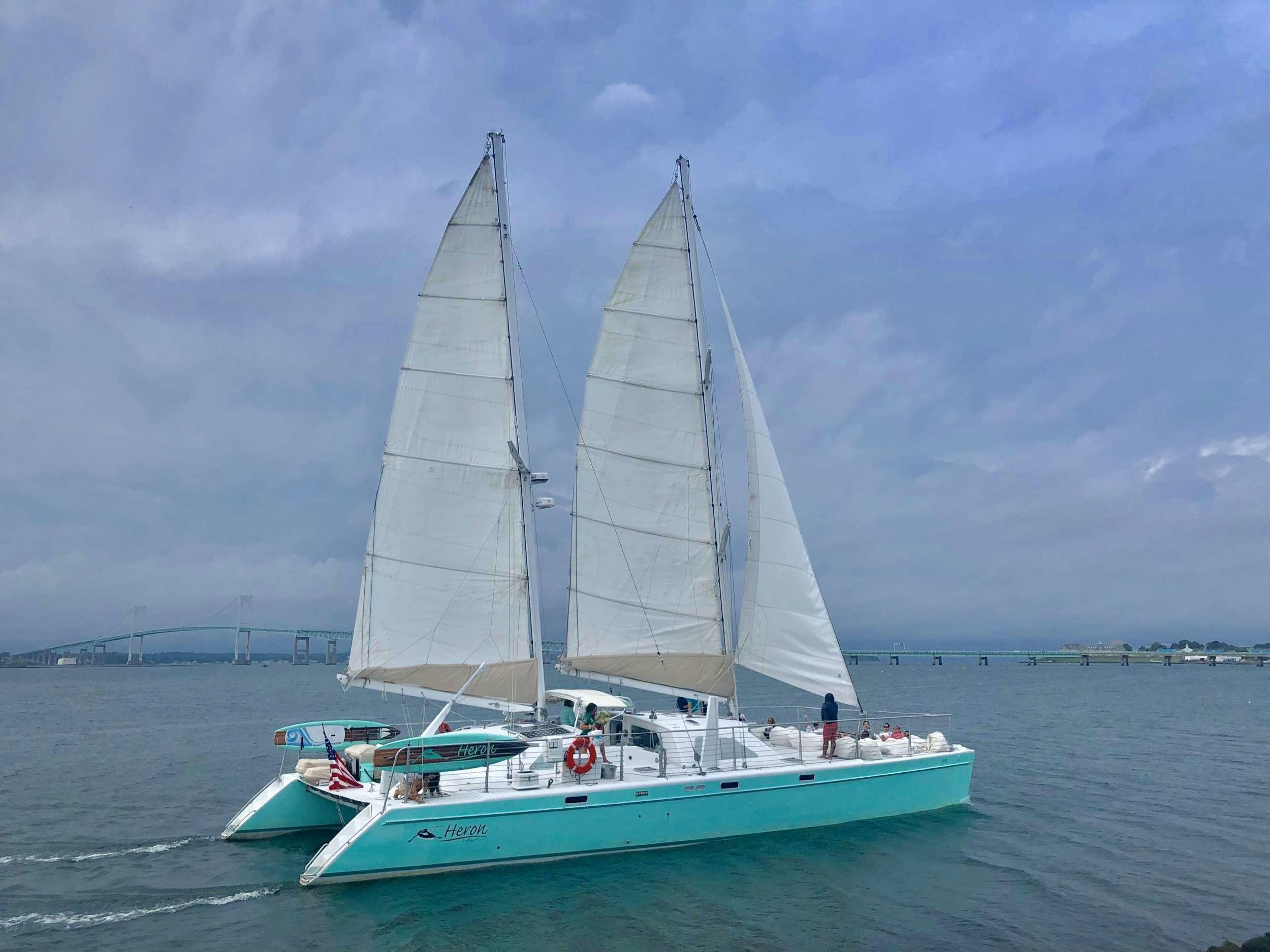 a sailboat on the water aboard HERON Yacht for Charter
