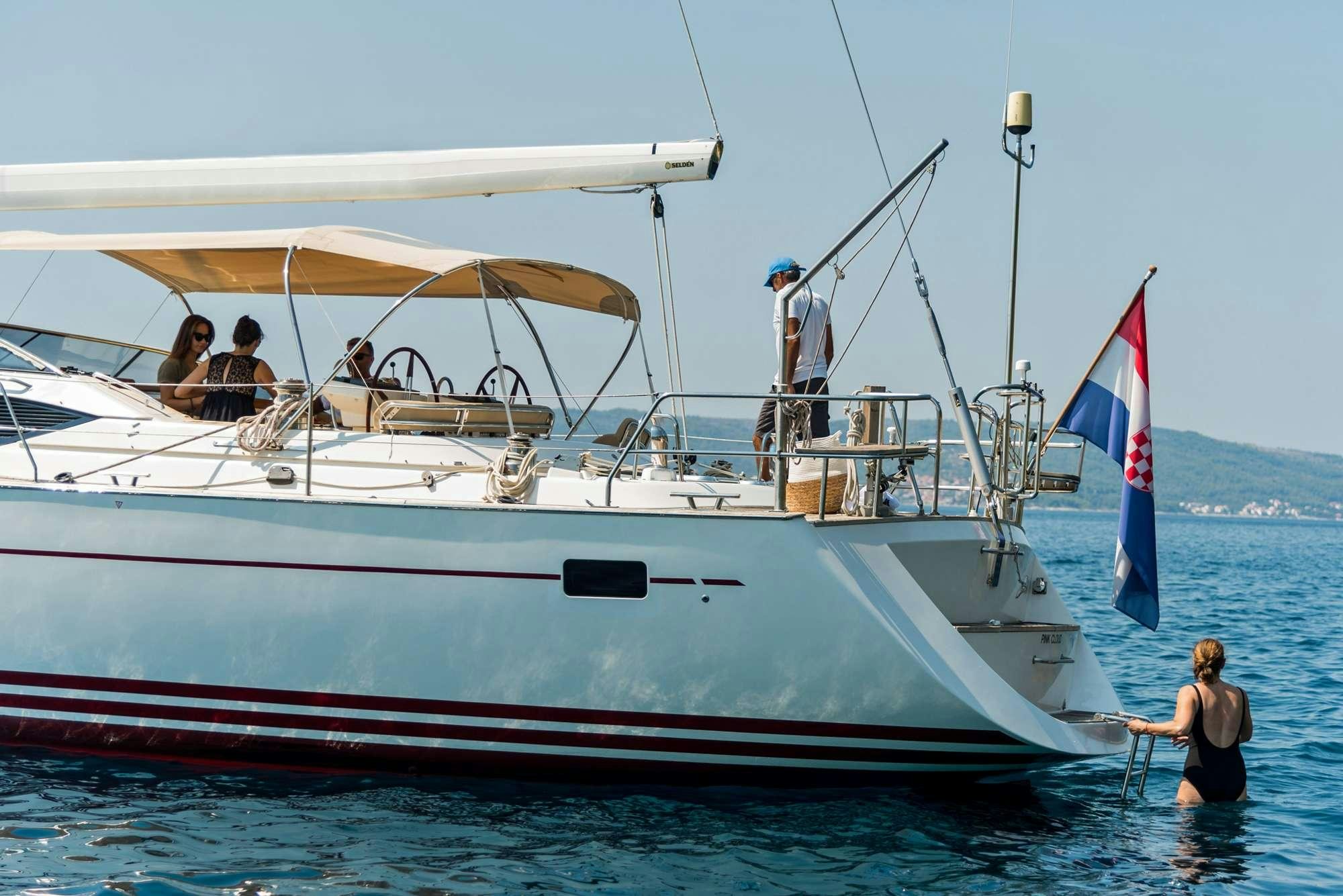 a boat with people on it aboard LUNULATA  Yacht for Charter