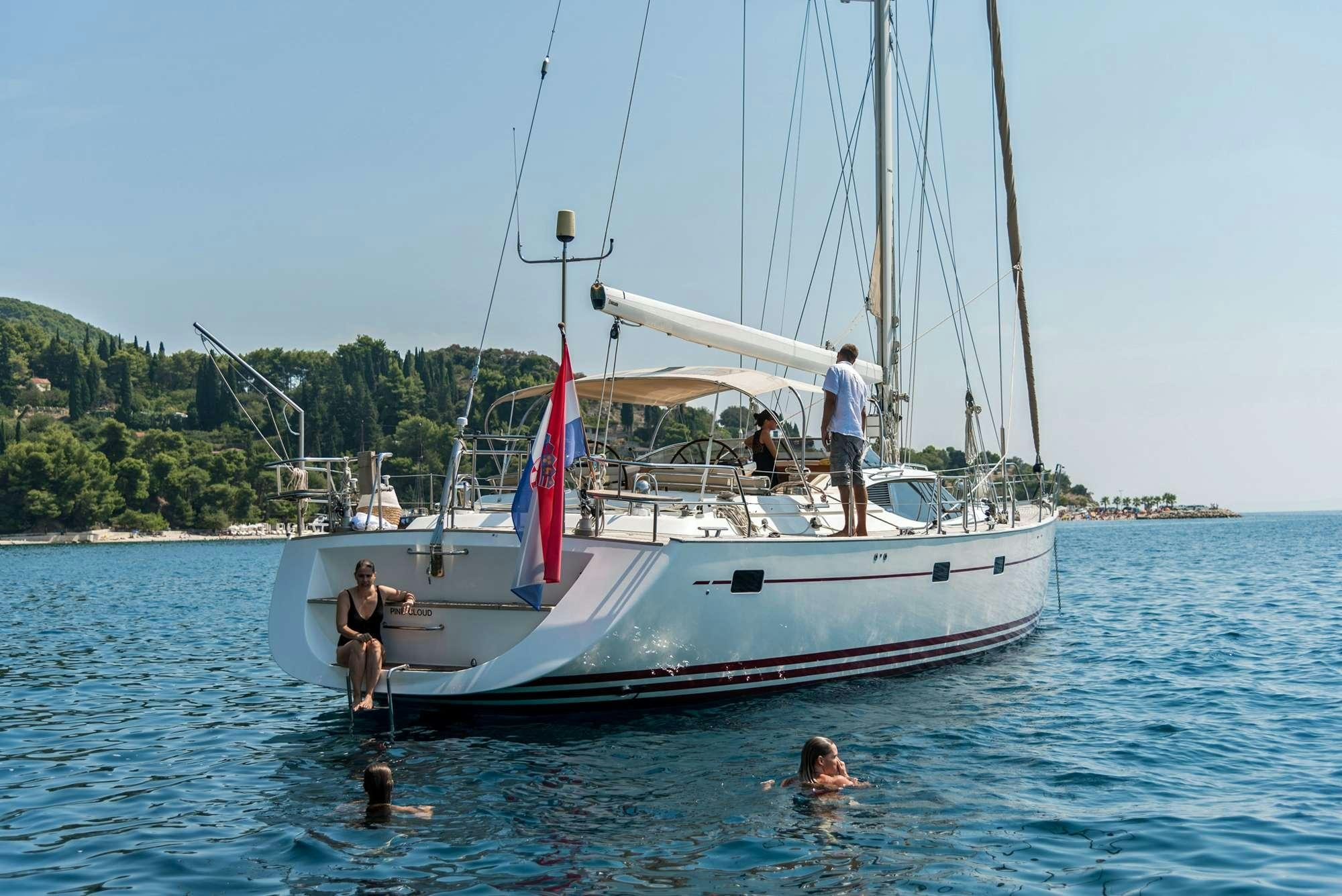 a boat in the water aboard LUNULATA  Yacht for Charter