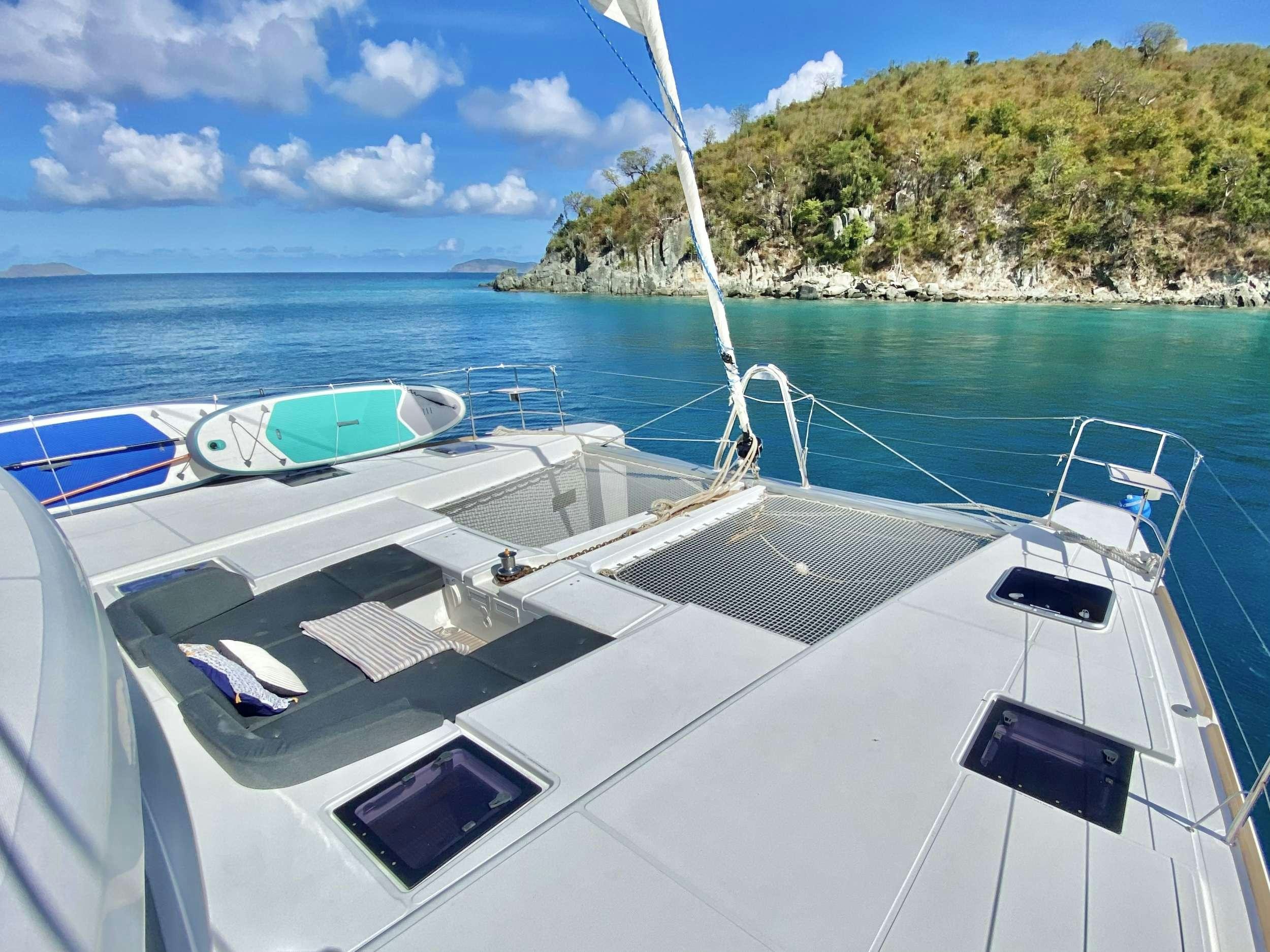 a boat on the water aboard CHAMPAGNE L52 Yacht for Charter