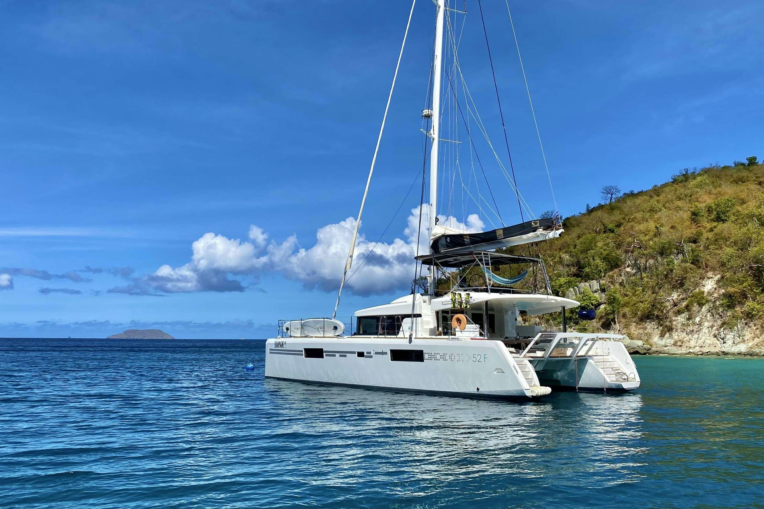 a boat in the water aboard CHAMPAGNE L52 Yacht for Charter