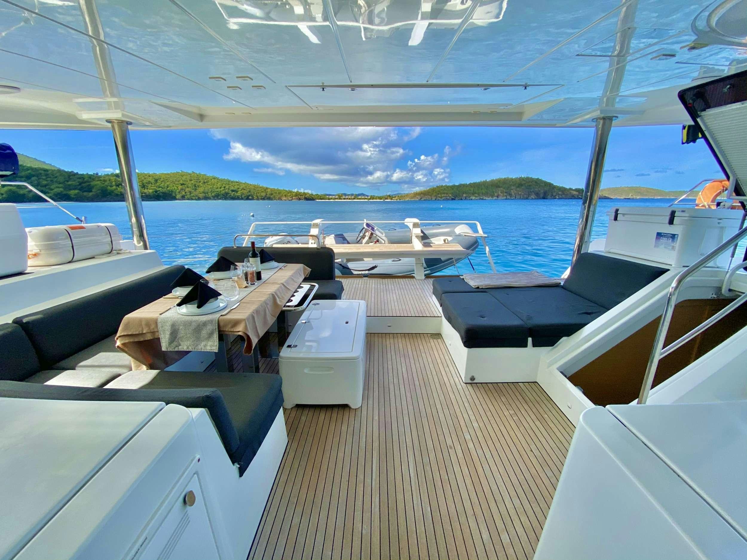a boat on the water aboard CHAMPAGNE L52 Yacht for Charter
