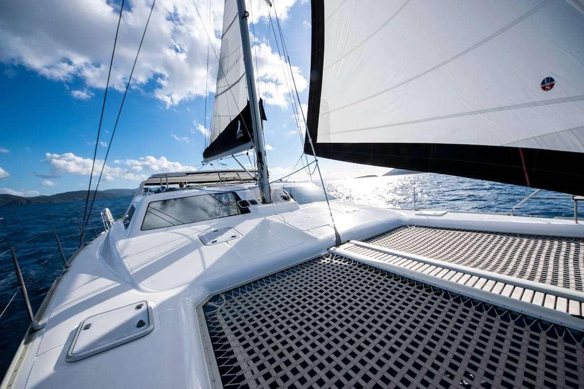 a boat on the water aboard PURPLE PELICAN Yacht for Charter