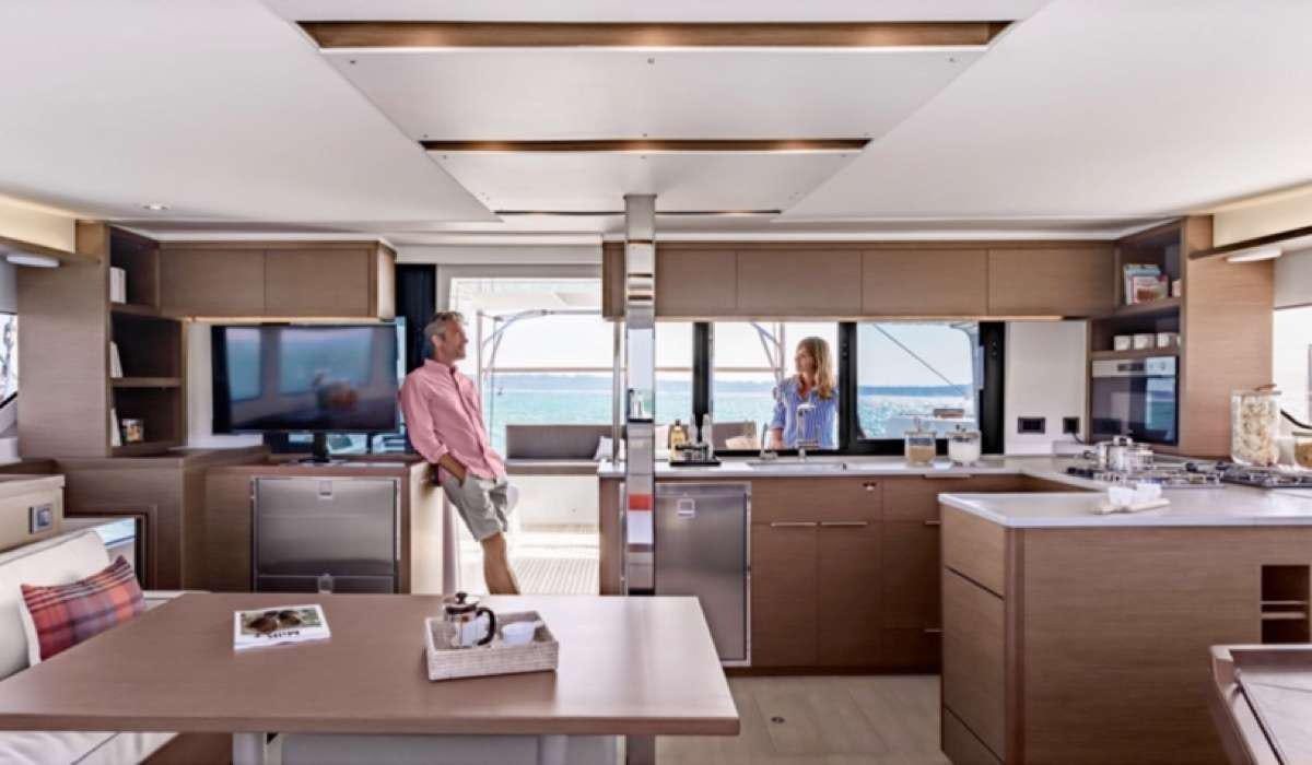 a person walking in a room aboard CELAVIE Yacht for Charter