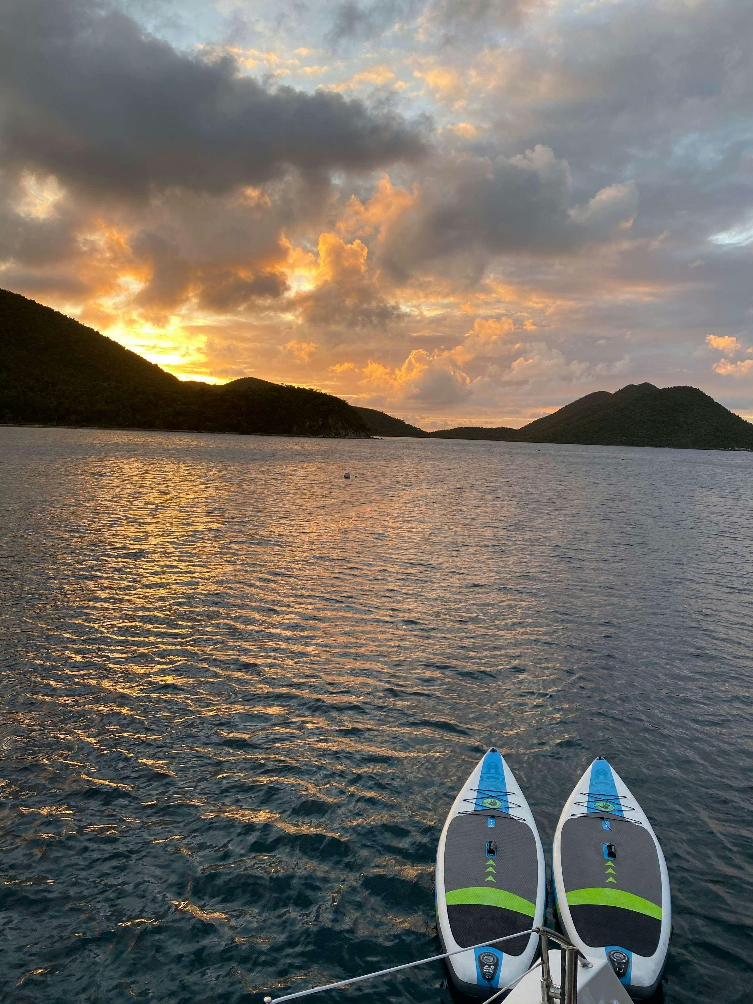 a pair of boats on a beach aboard Sol Mates Yacht for Charter