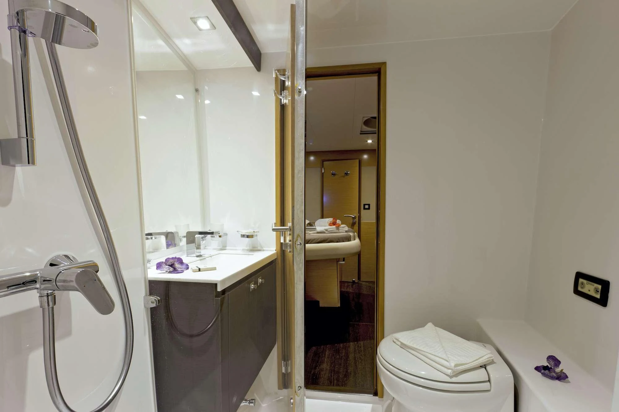 a bathroom with a glass shower aboard GRATITUDE Yacht for Charter