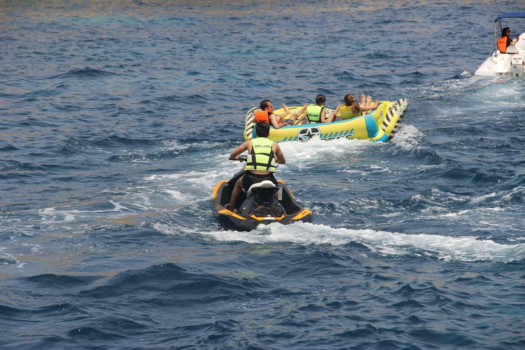 a group of people in a raft aboard CLAREMONT Yacht for Charter
