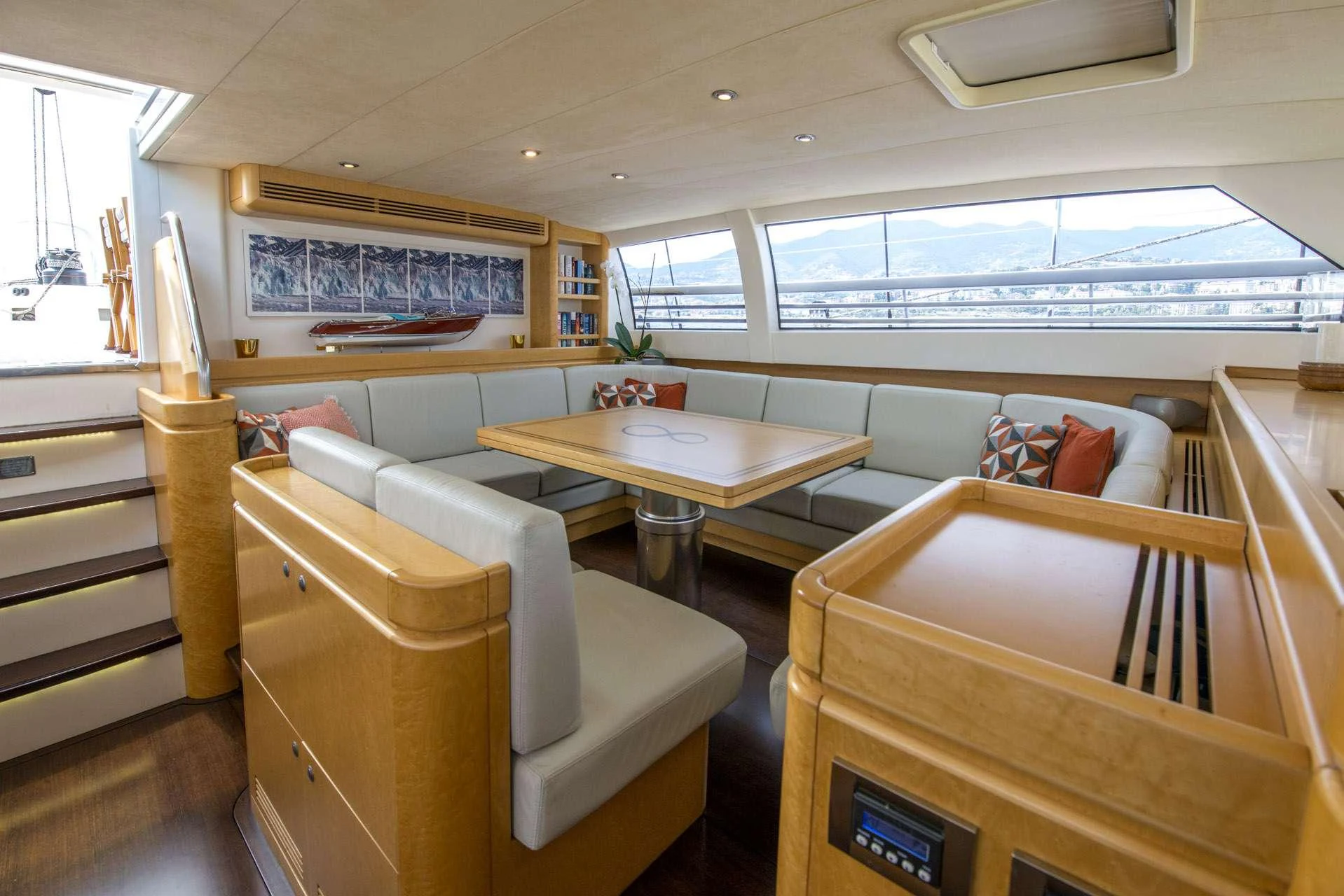 a room with a table and chairs aboard LADY 8 Yacht for Charter