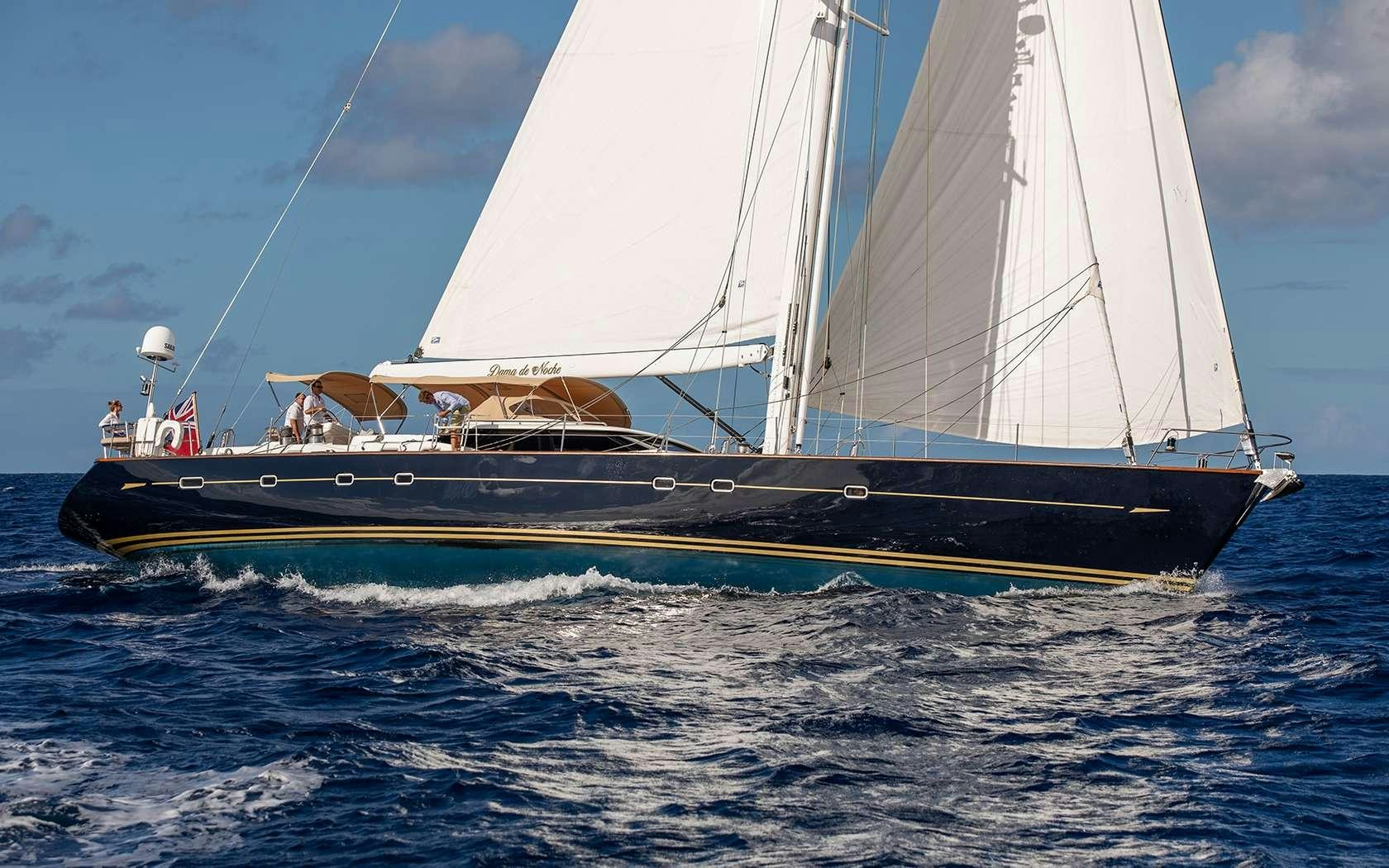 a sailboat on the water aboard DAMA DE NOCHE Yacht for Charter