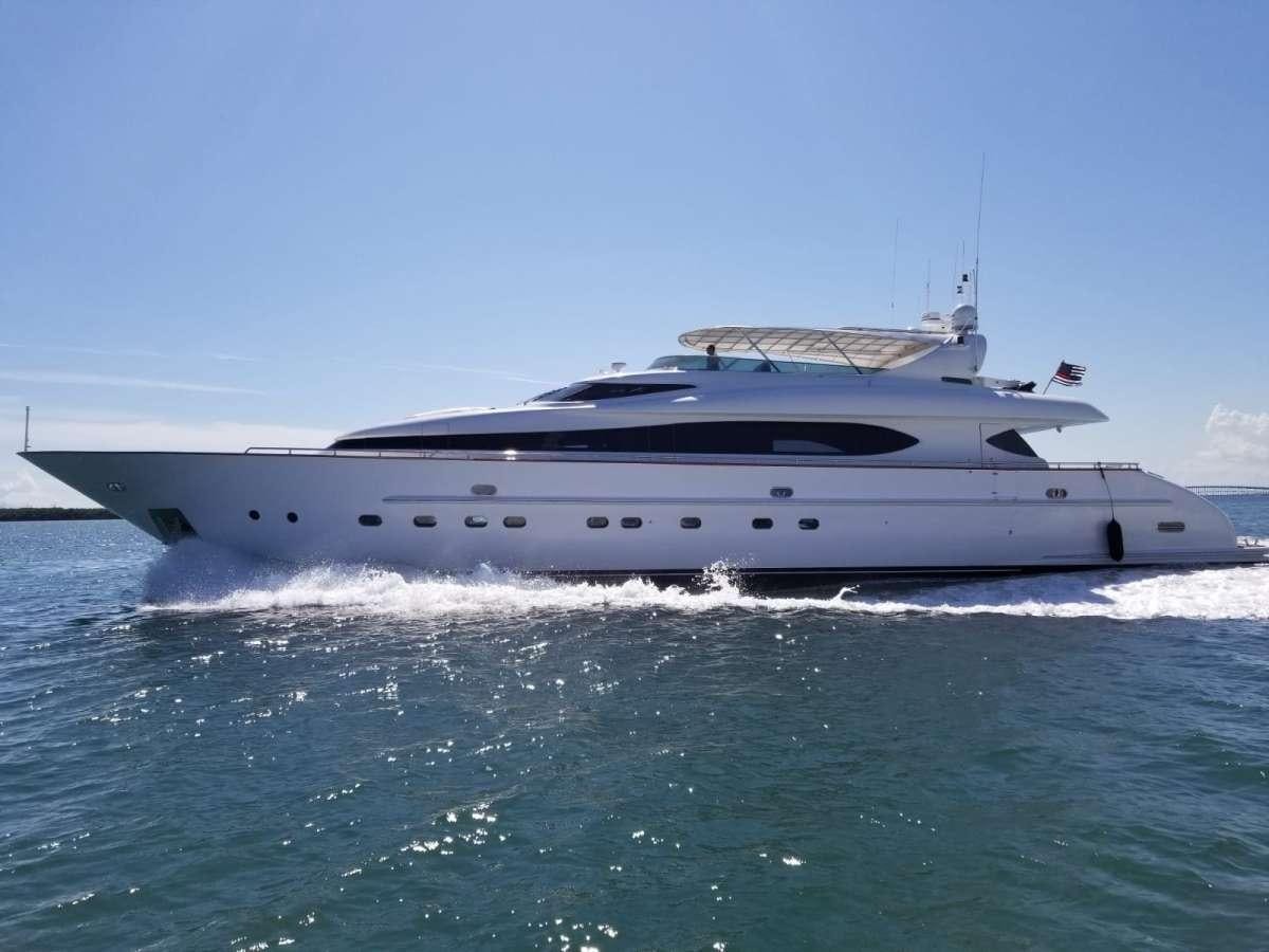 a white yacht in the water aboard 103' CUSTOM BUILD Yacht for Charter