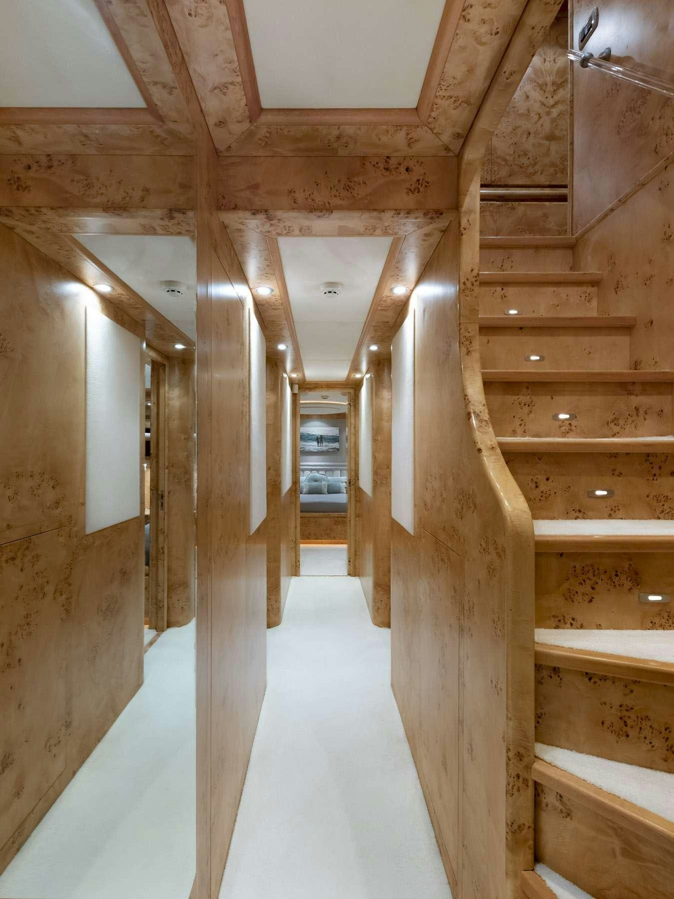 a long hallway with wood floors aboard ANDILIS Yacht for Charter