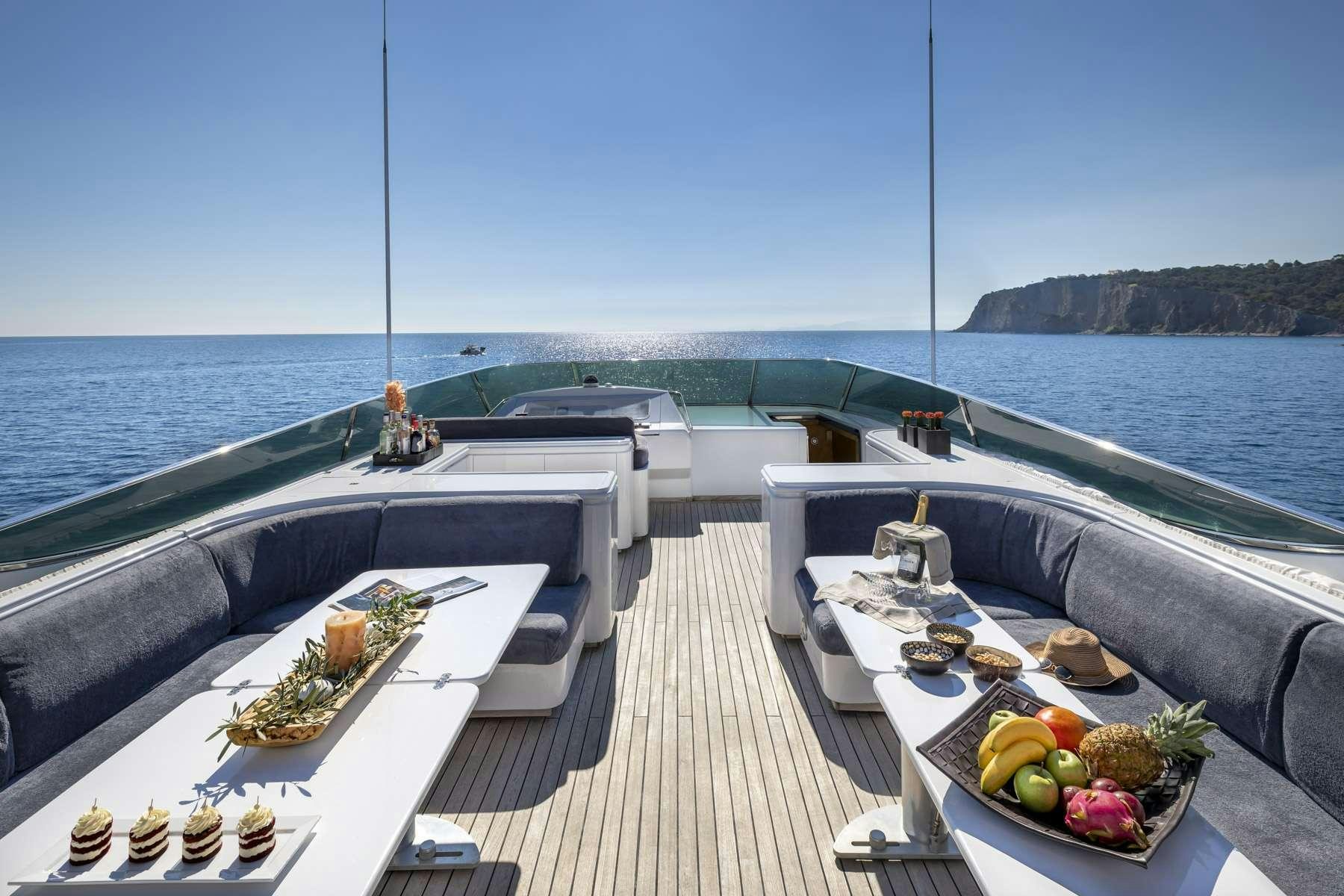 a boat with fruit on it aboard ANDILIS Yacht for Charter