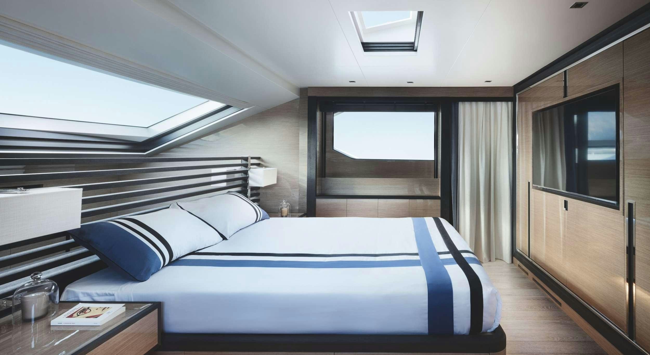a bed in a room aboard REINE D'AZUR Yacht for Charter