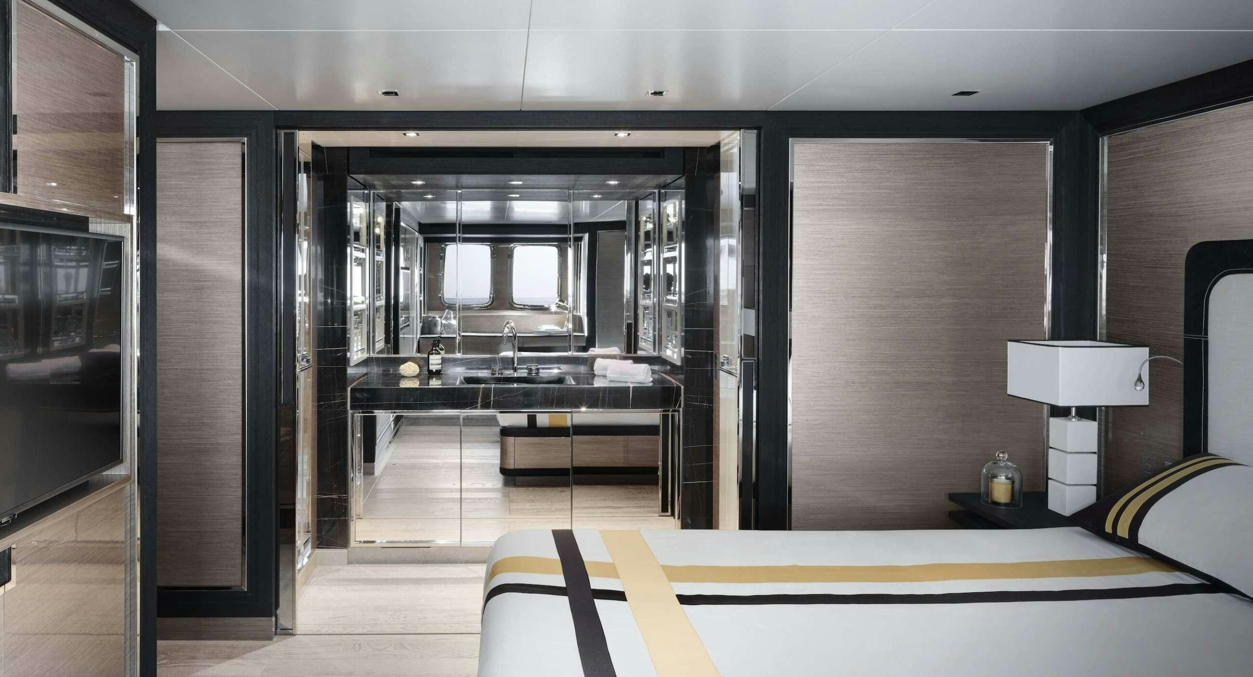 a room with a large mirror aboard REINE D'AZUR Yacht for Charter