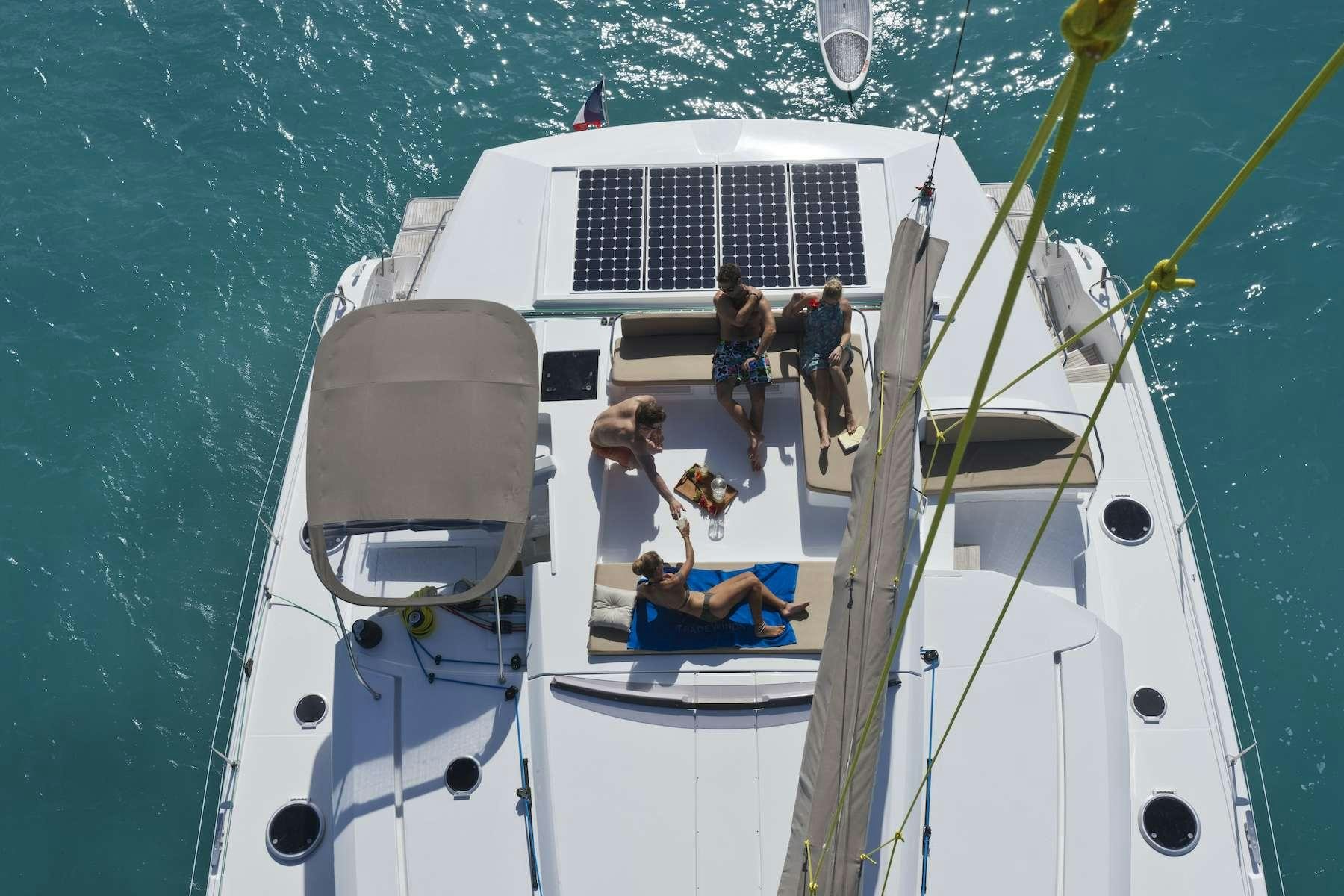 a group of people on a boat aboard TE MOANA - LUXURY TW59 Yacht for Charter