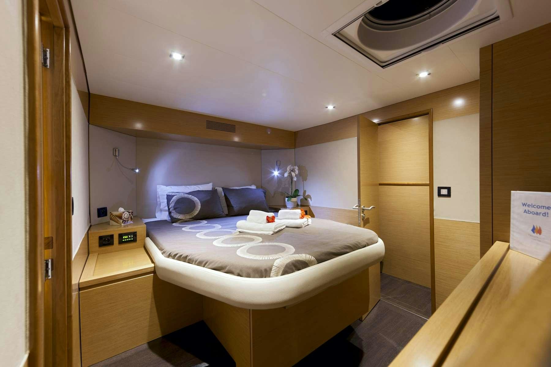 a bathroom with a large bathtub aboard TE MOANA - LUXURY TW59 Yacht for Charter