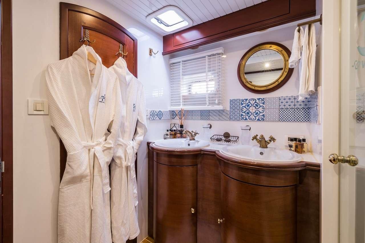 a robe on a door aboard OMBRE BLU³ Yacht for Charter