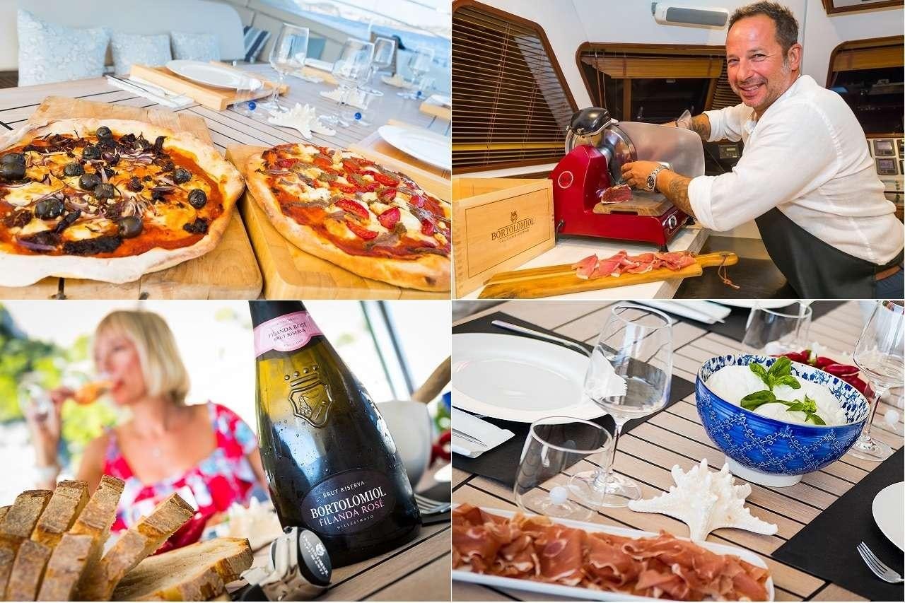 a person making pizzas aboard OMBRE BLU³ Yacht for Charter