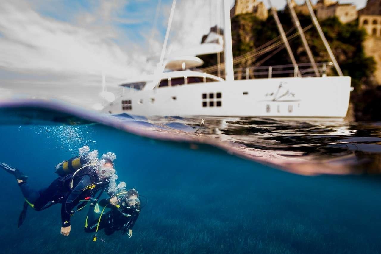 a boat in the water aboard OMBRE BLU³ Yacht for Charter