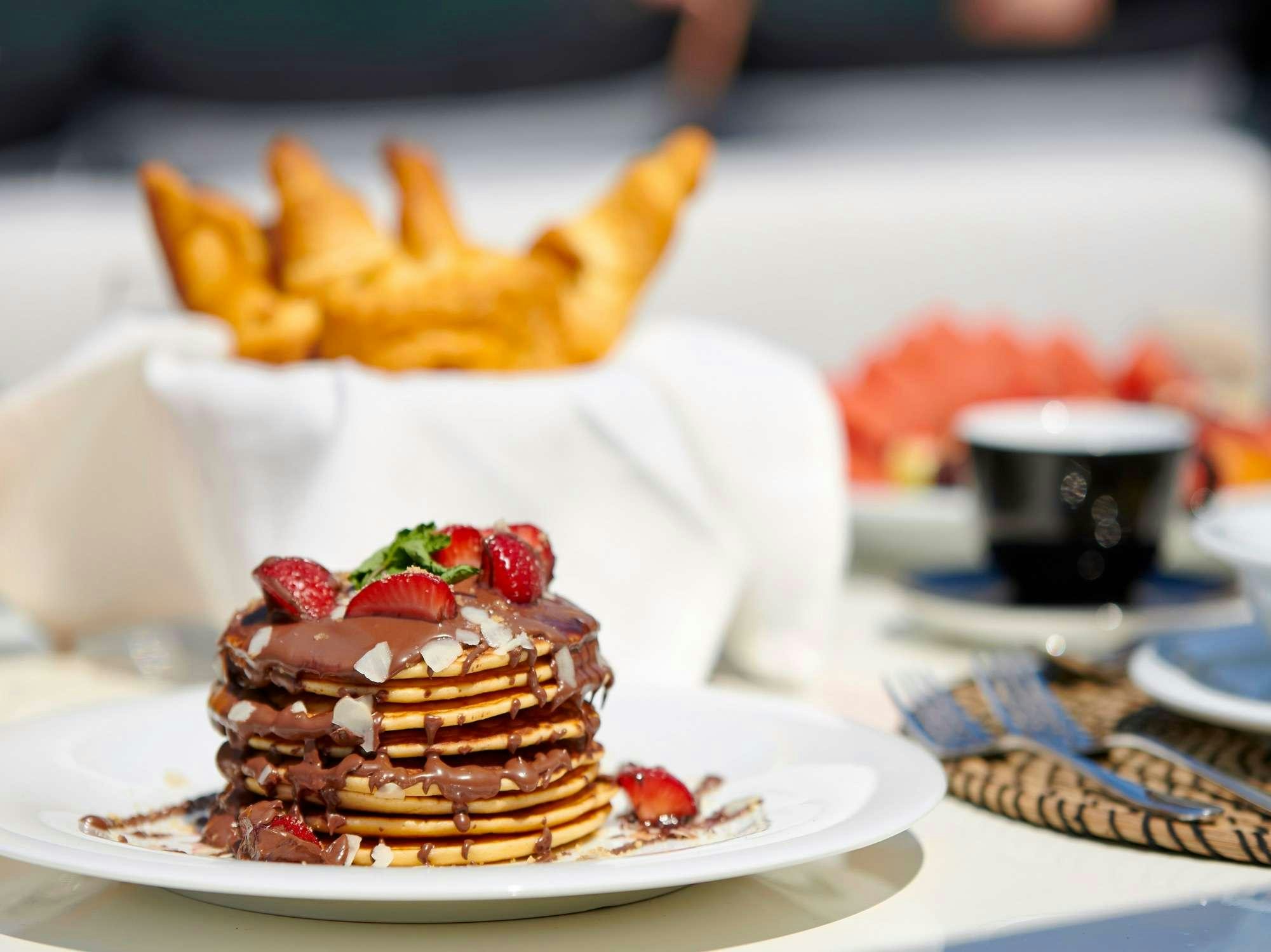a plate of dessert aboard RUBY Yacht for Charter