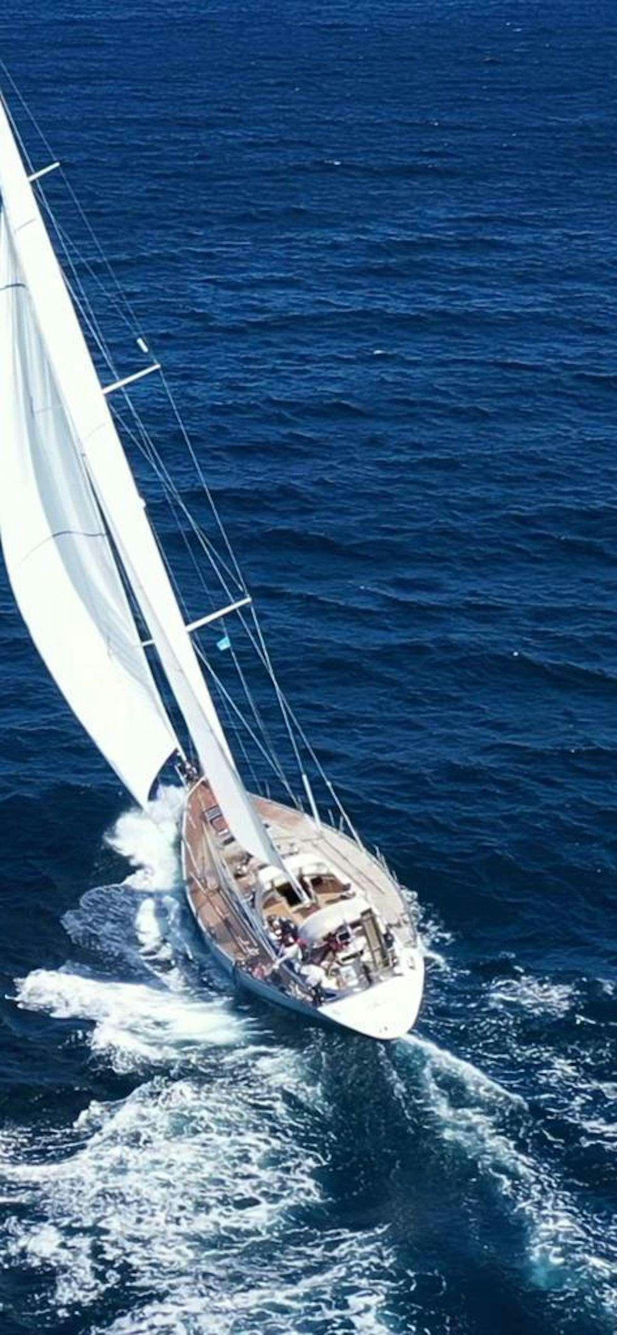 a boat sailing on the sea aboard AURORA Yacht for Charter