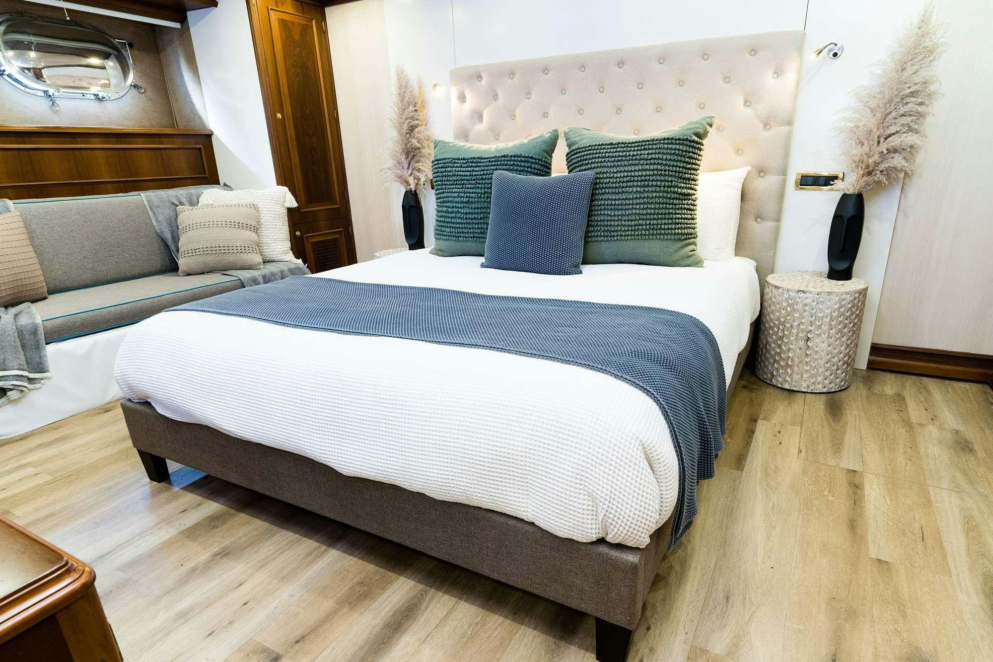 a couple of beds in a room aboard IRAMA Yacht for Charter