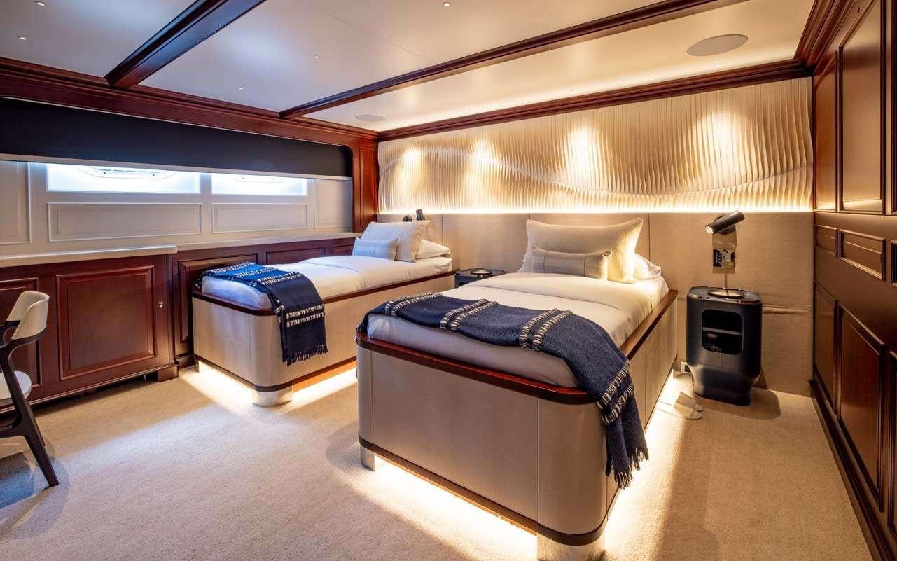a couple of beds in a room aboard BROADWATER Yacht for Charter
