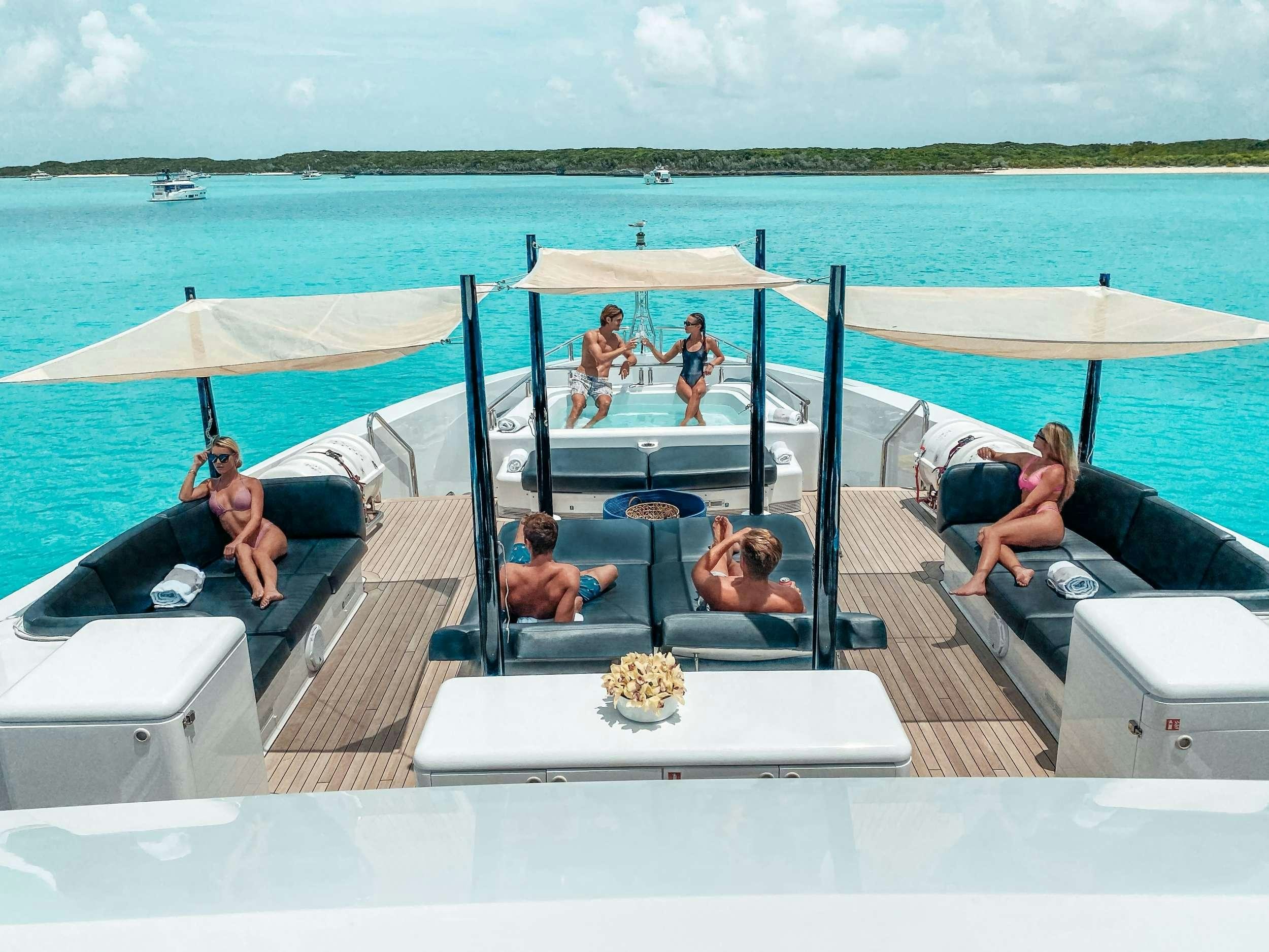 a group of people on a boat aboard OCULUS Yacht for Charter