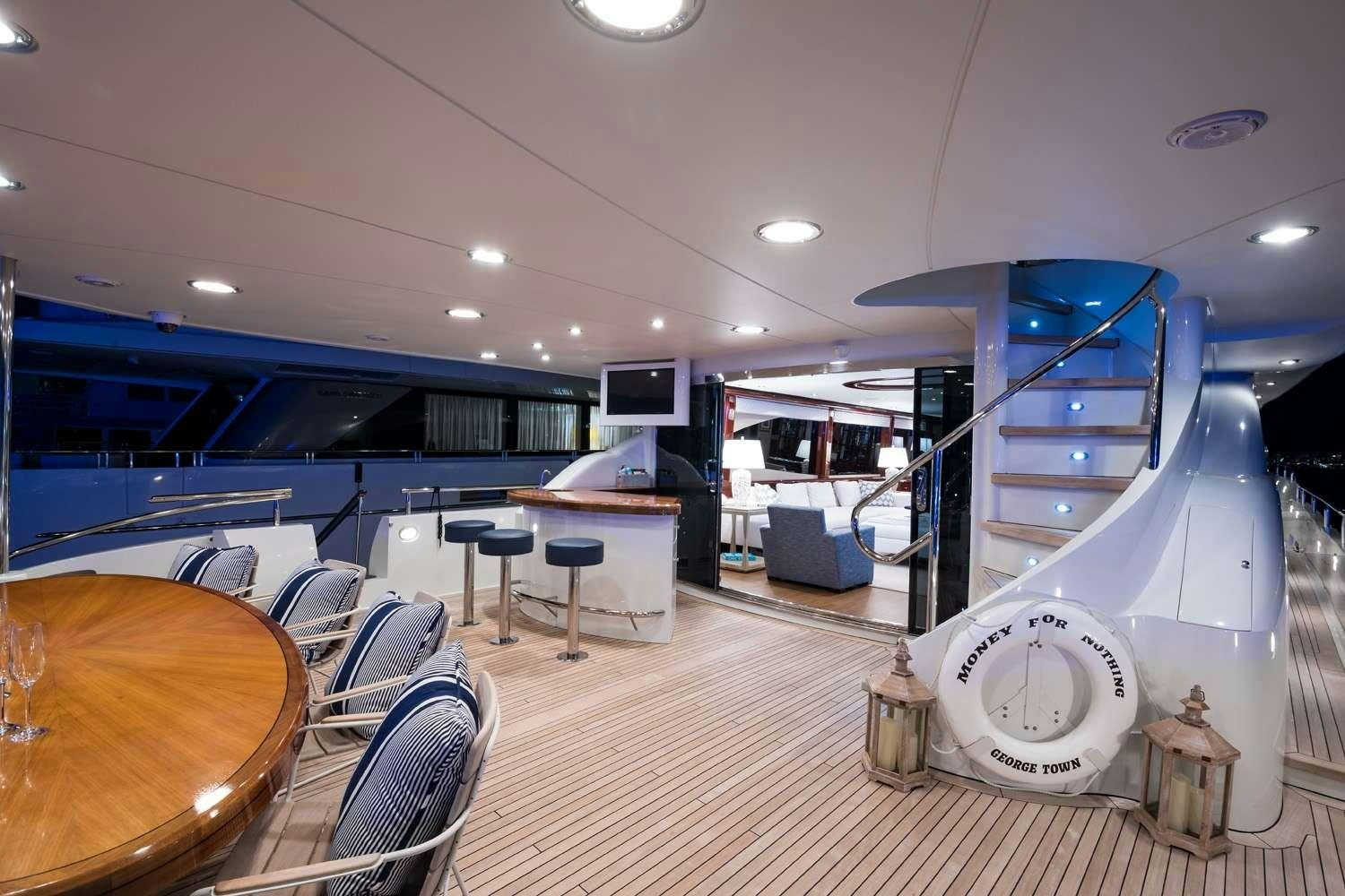 a large white machine in a room aboard QTR Yacht for Charter