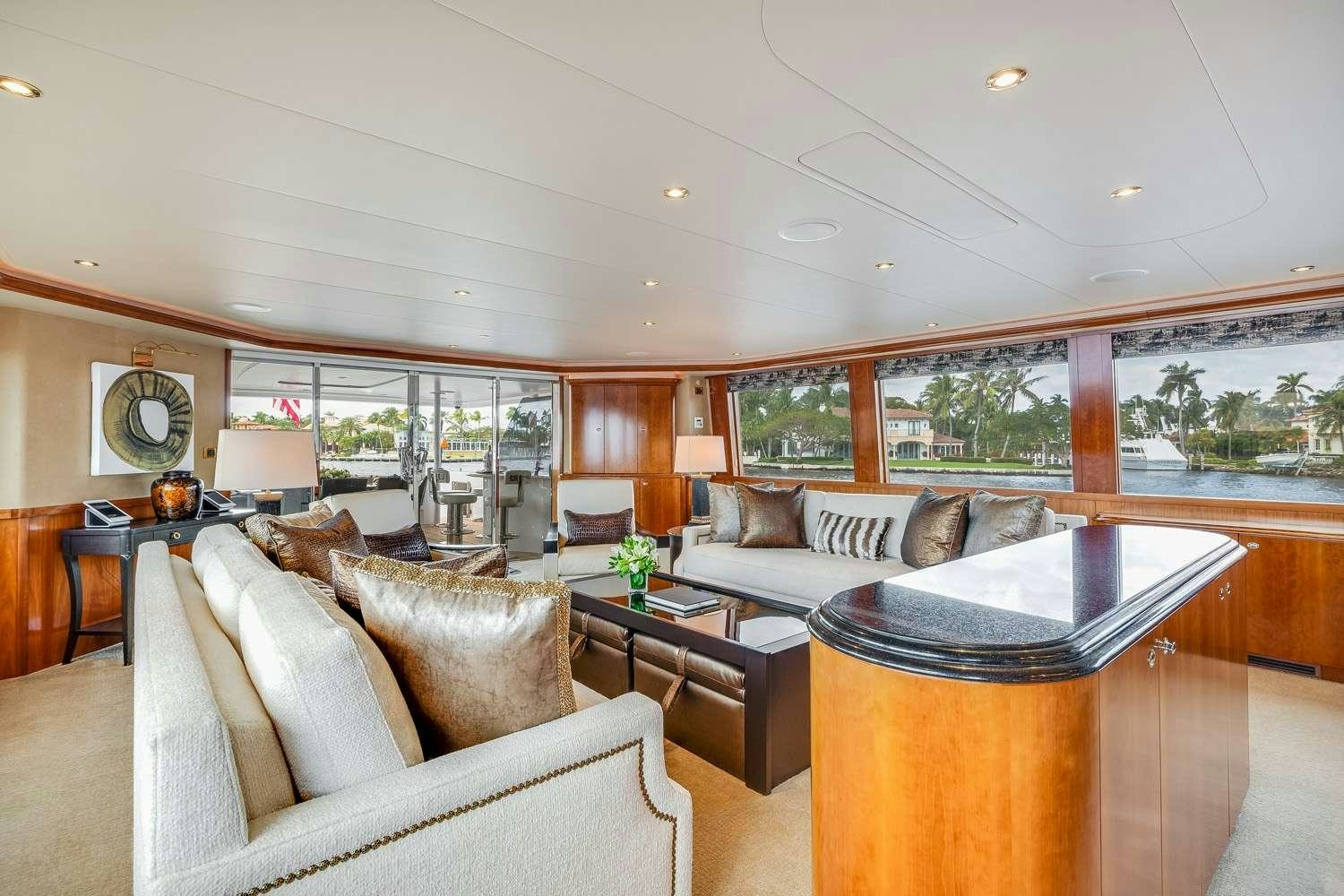 a living room with a large glass window aboard MY WAY Yacht for Charter