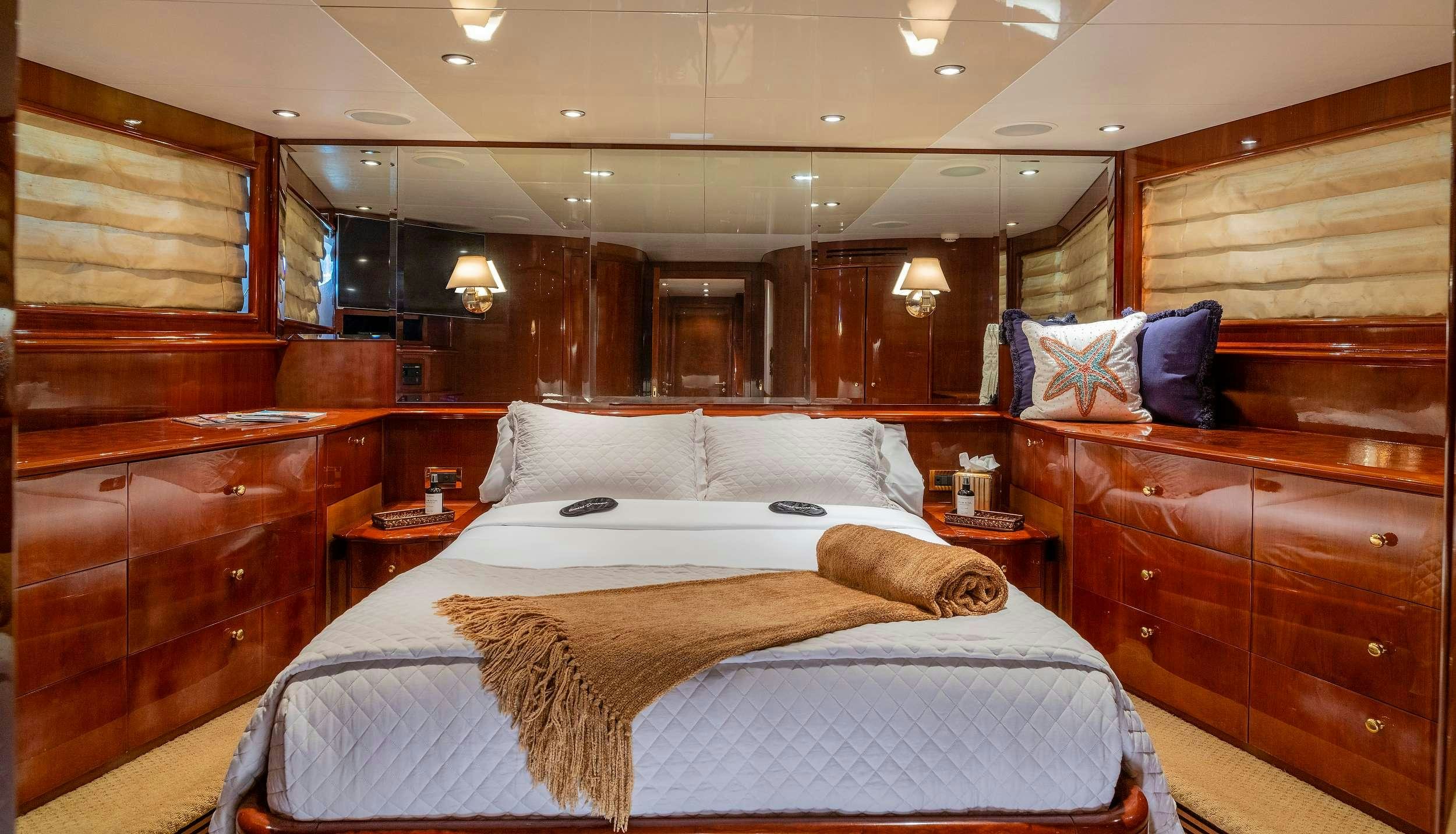 a bed in a cabin aboard OUTTA TOUCH Yacht for Charter