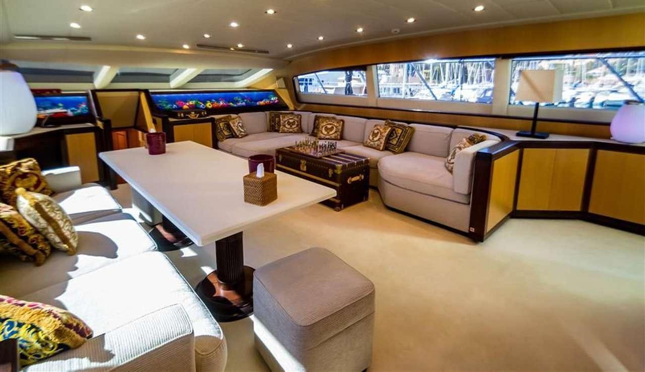a room with a couch and a table aboard DAYA Yacht for Charter